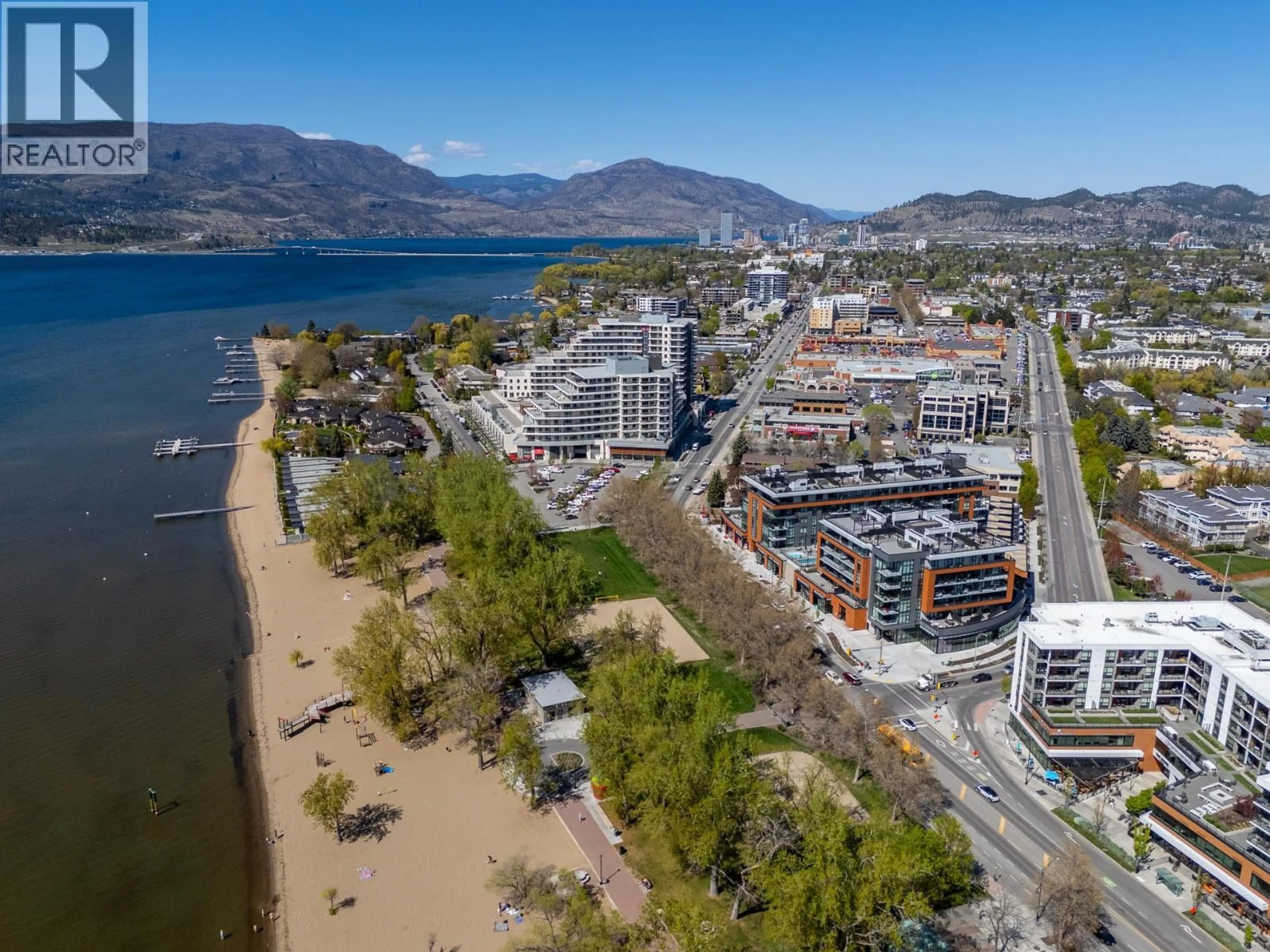 A pic from outside/outdoor area/front of a property/back of a property/a pic from drone, water/lake/river/ocean view for 407 - 3409 LAKESHORE ROAD, Kelowna British Columbia V1W0G6