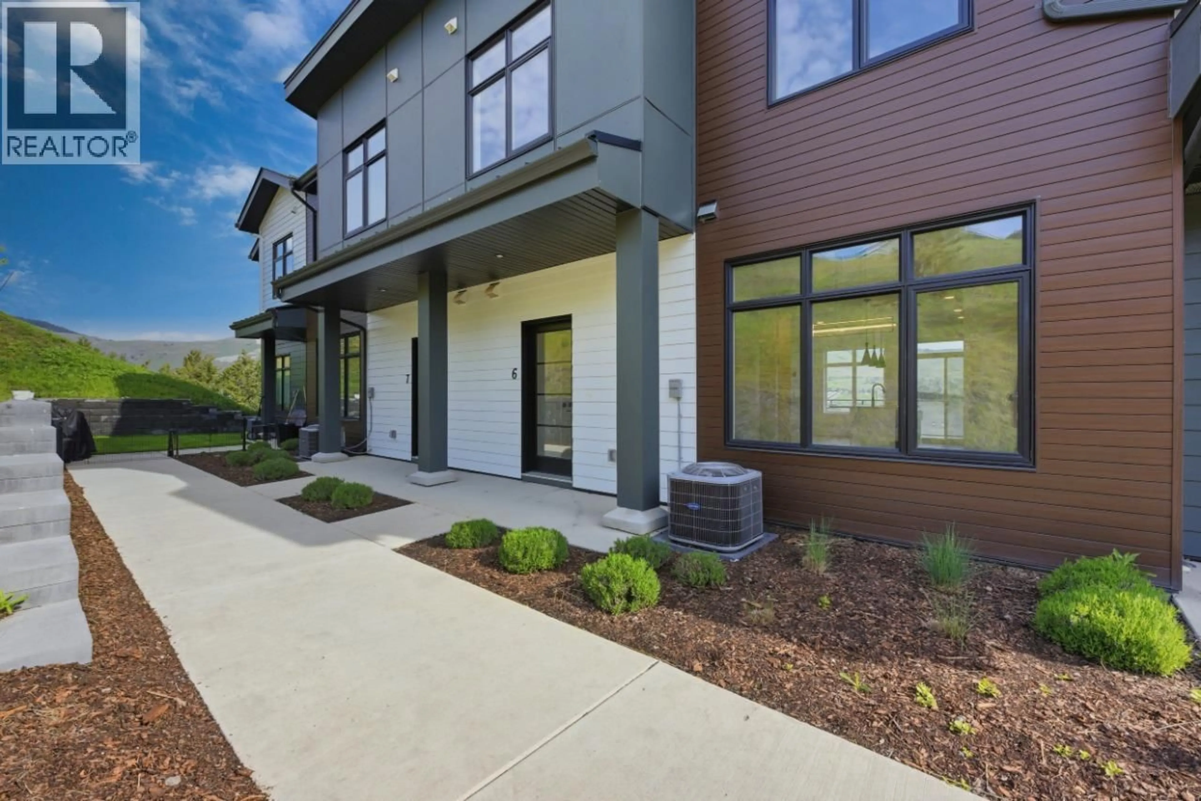 Home with brick exterior material, street for 6 - 7599 KLINGER ROAD, Vernon British Columbia V1H0B2