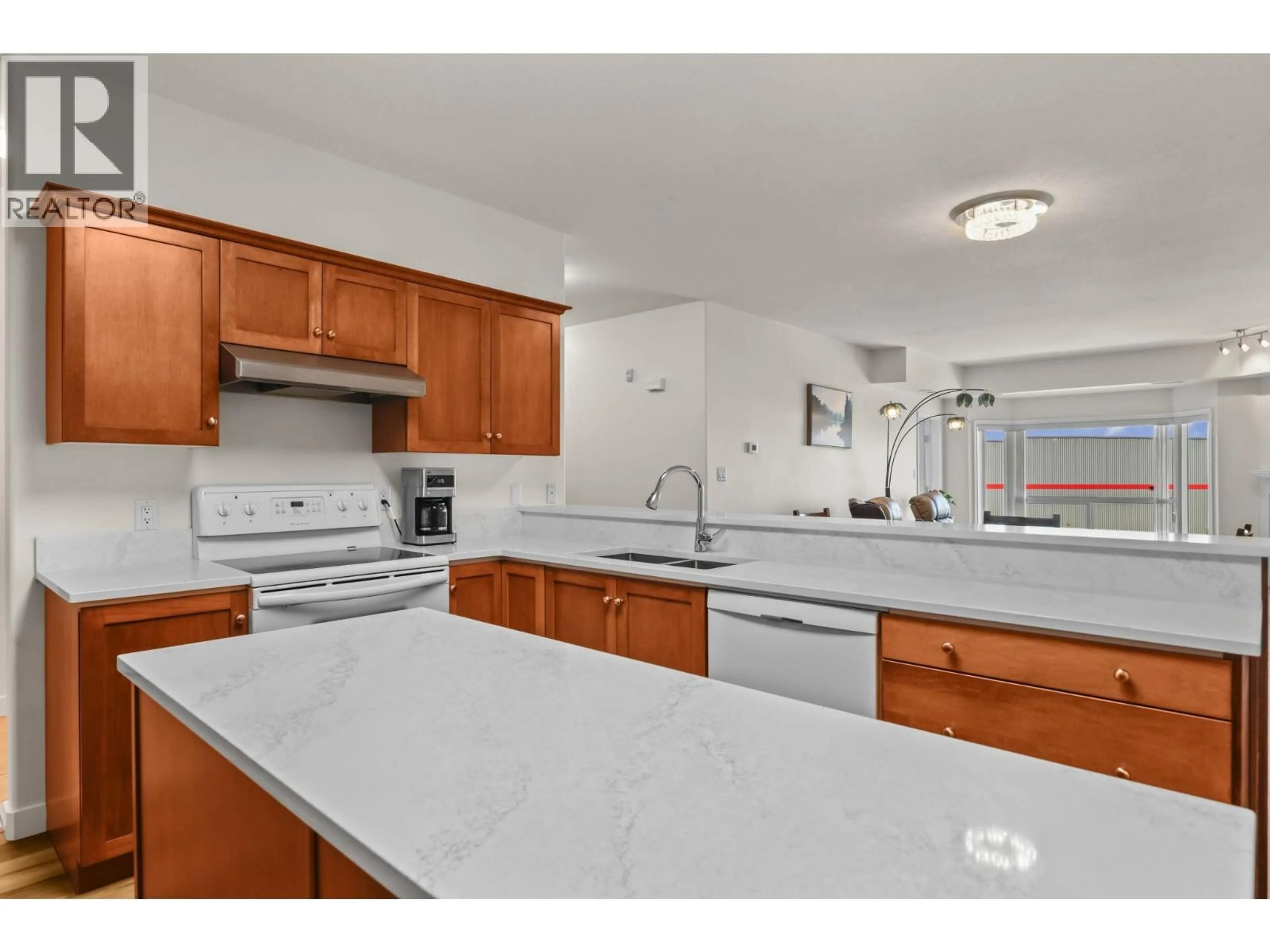 Open concept kitchen, ceramic/tile floor for 303 - 1963 DURNIN ROAD, Kelowna British Columbia V1X7Y4