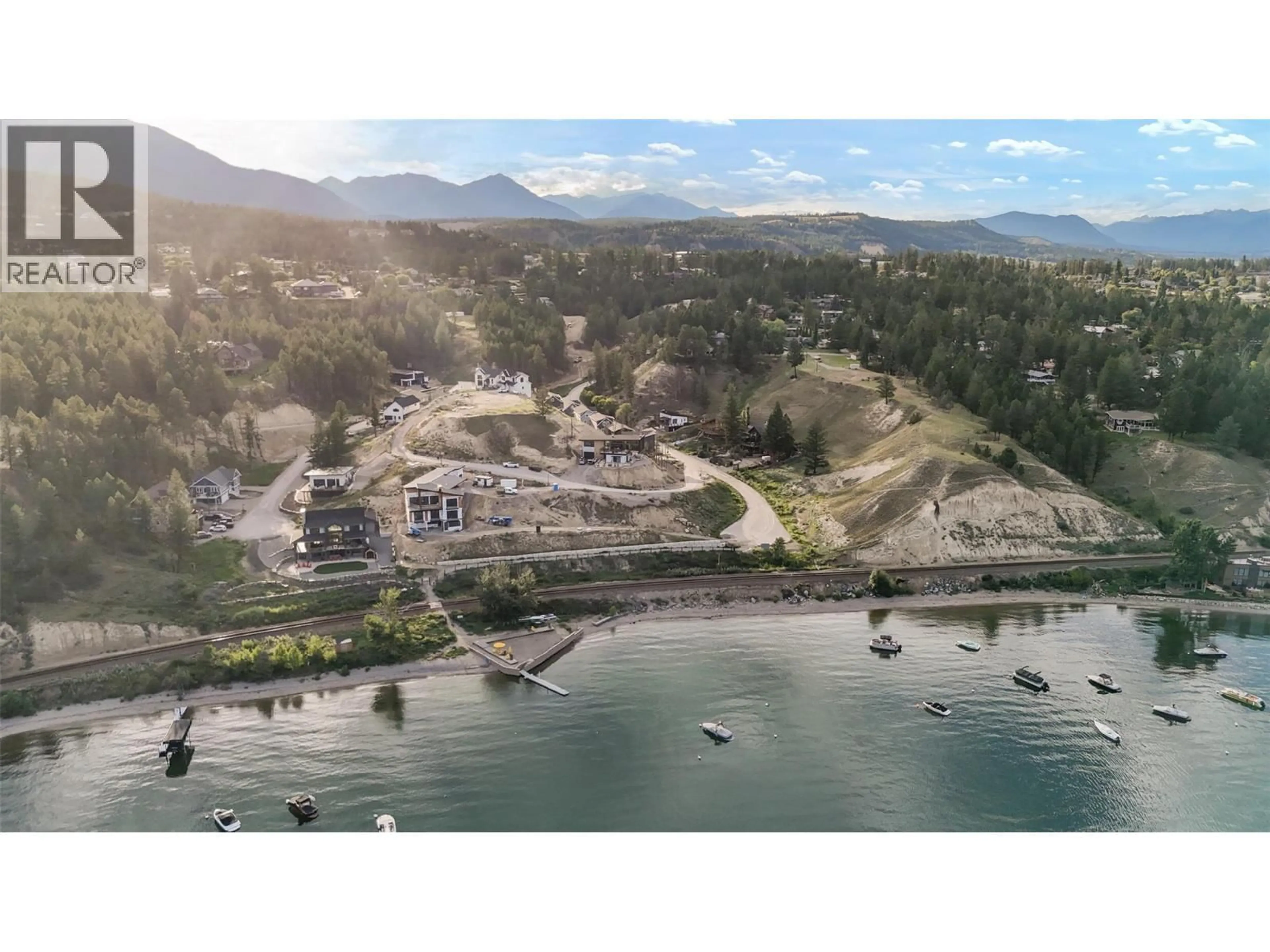 A pic from outside/outdoor area/front of a property/back of a property/a pic from drone, water/lake/river/ocean view for 726 TAYNTON DRIVE, Invermere British Columbia V0A1K6