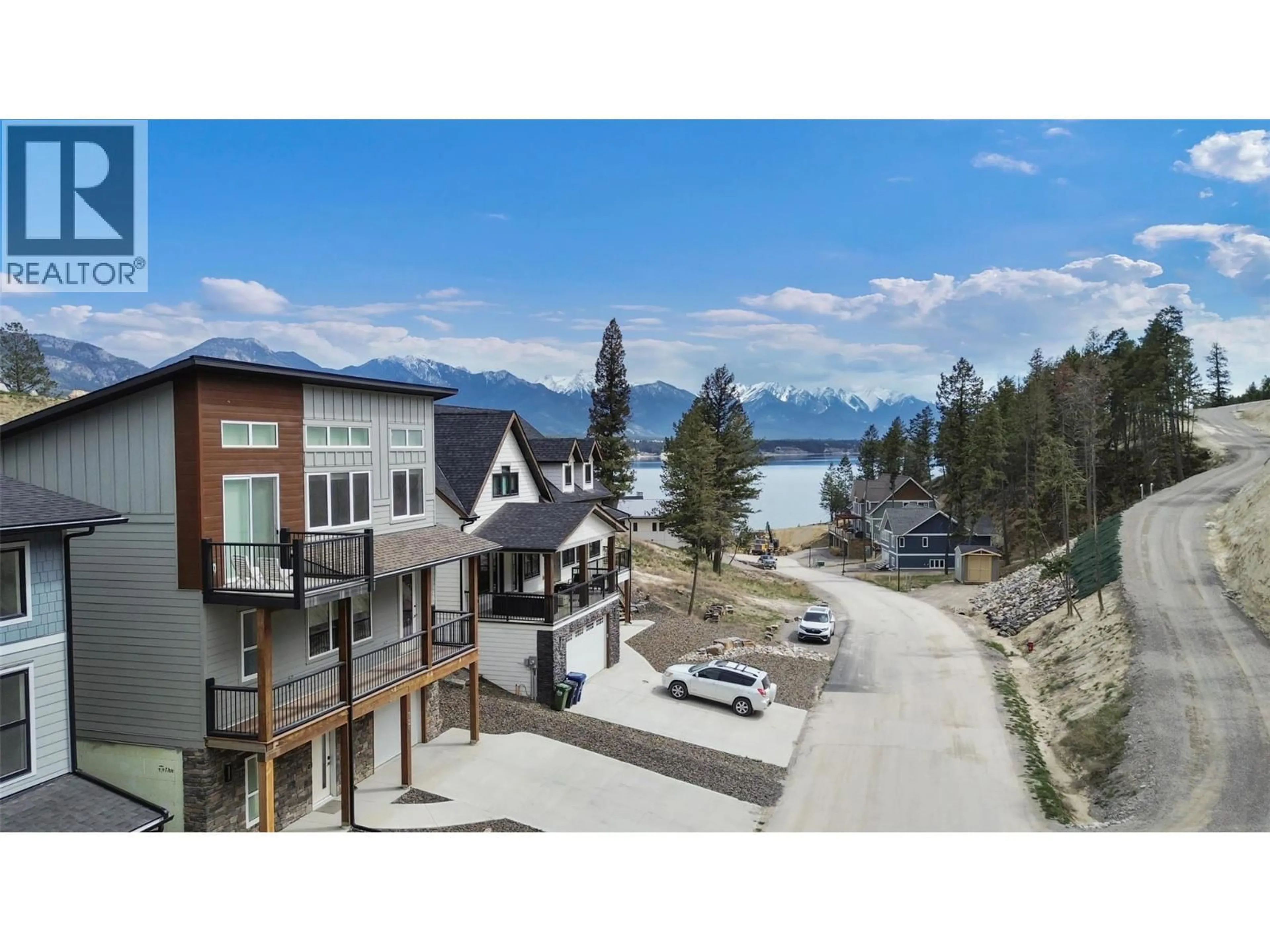 A pic from outside/outdoor area/front of a property/back of a property/a pic from drone, water/lake/river/ocean view for 726 TAYNTON DRIVE, Invermere British Columbia V0A1K6