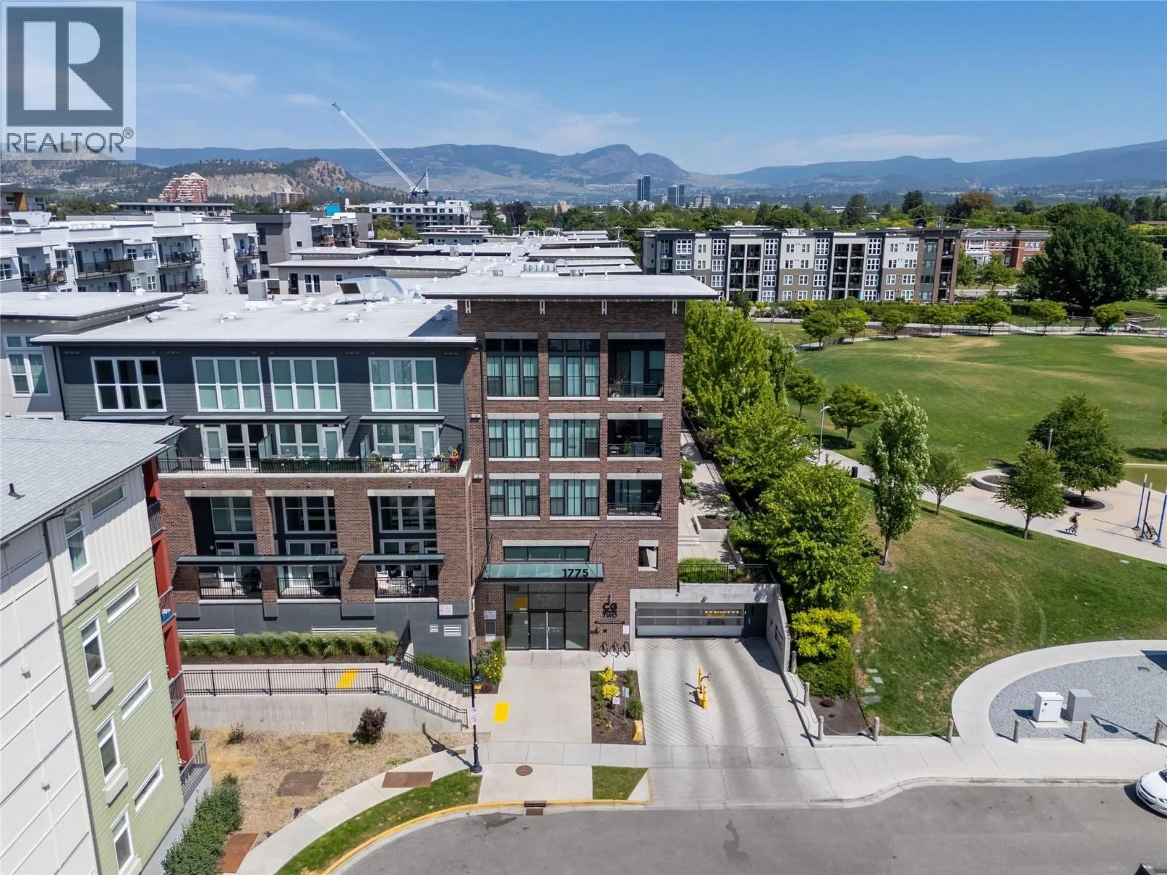 A pic from outside/outdoor area/front of a property/back of a property/a pic from drone, mountain view for 116 - 1775 CHAPMAN PLACE, Kelowna British Columbia V1Y0G3
