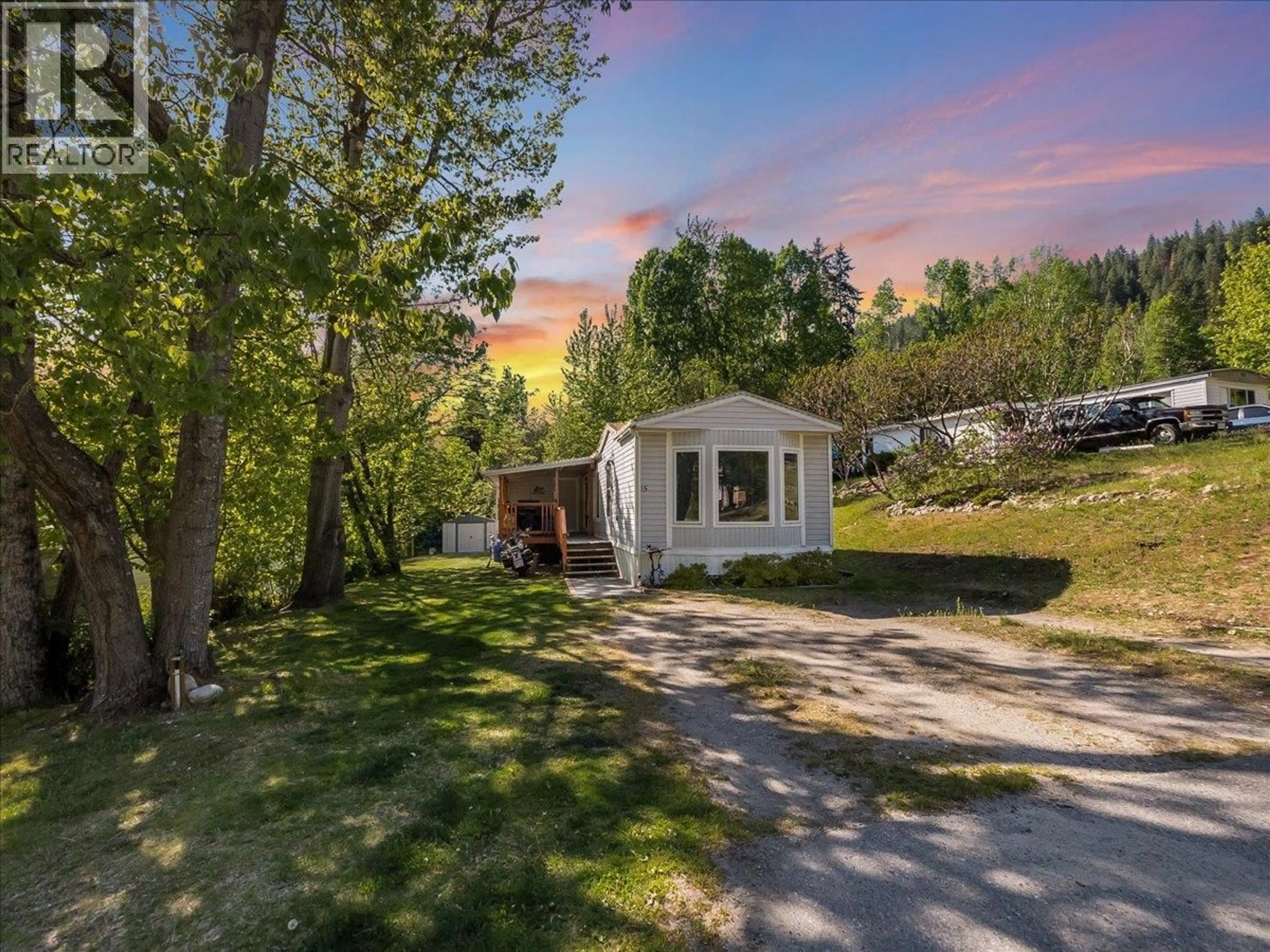A pic from outside/outdoor area/front of a property/back of a property/a pic from drone, unknown for 15 - 4029 BROADWATER ROAD, Castlegar British Columbia V1N4V6