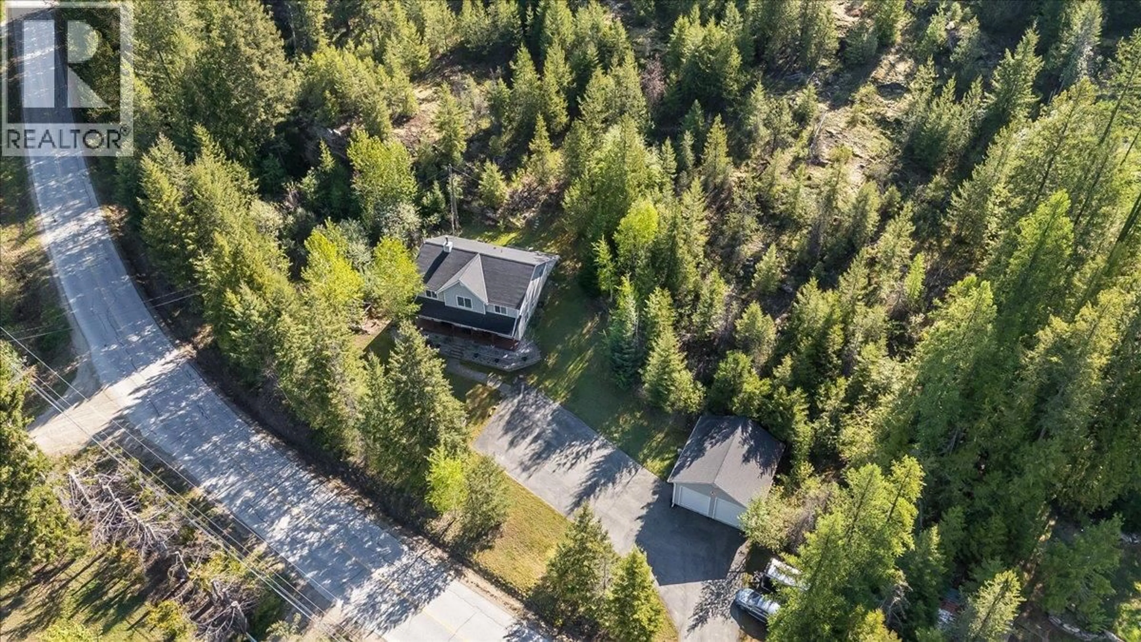 A pic from outside/outdoor area/front of a property/back of a property/a pic from drone, forest/trees view for 2095 PASS CREEK ROAD, Castlegar British Columbia v1n4t1