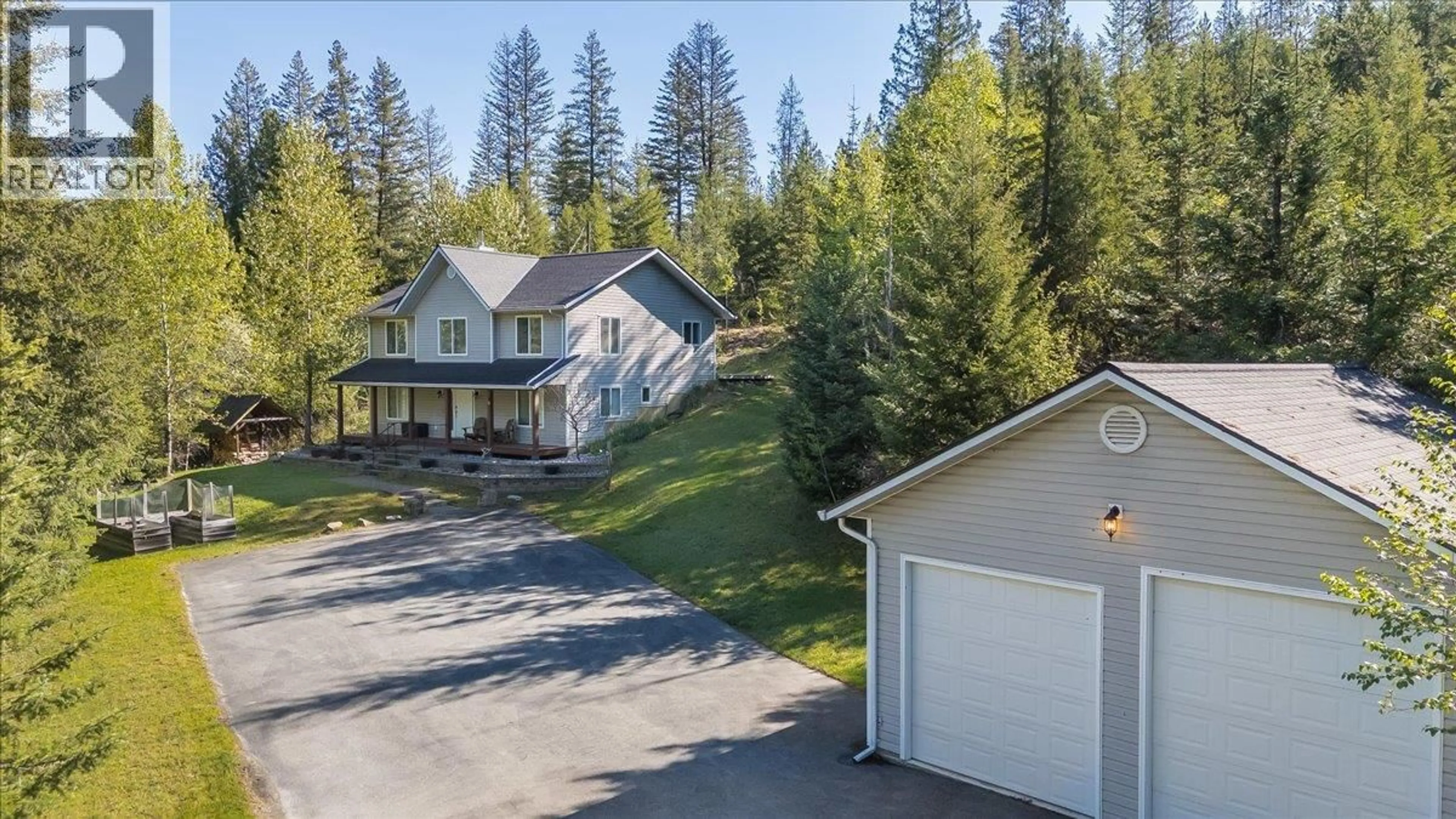 A pic from outside/outdoor area/front of a property/back of a property/a pic from drone, unknown for 2095 PASS CREEK ROAD, Castlegar British Columbia v1n4t1