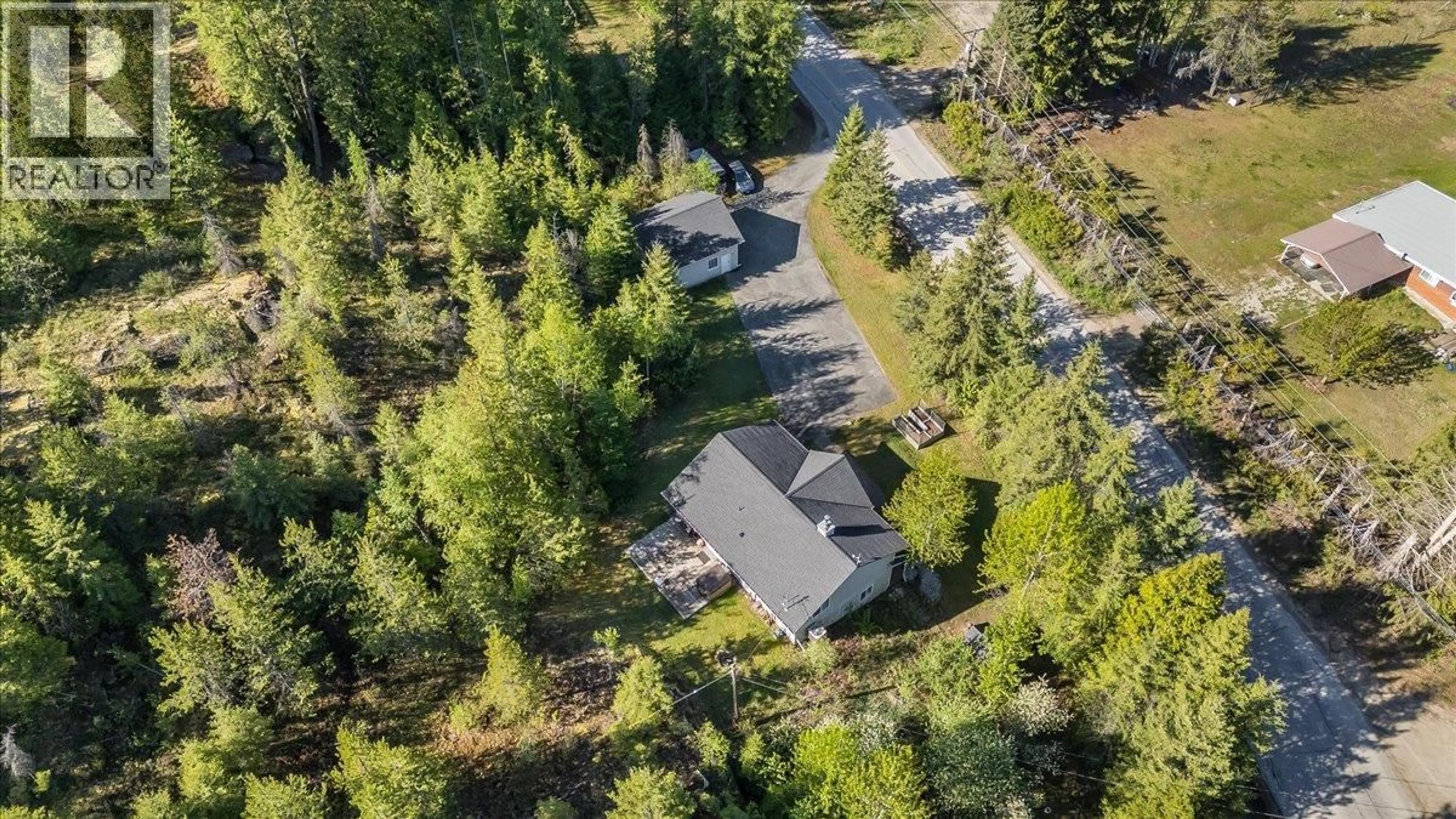 A pic from outside/outdoor area/front of a property/back of a property/a pic from drone, forest/trees view for 2095 PASS CREEK ROAD, Castlegar British Columbia v1n4t1