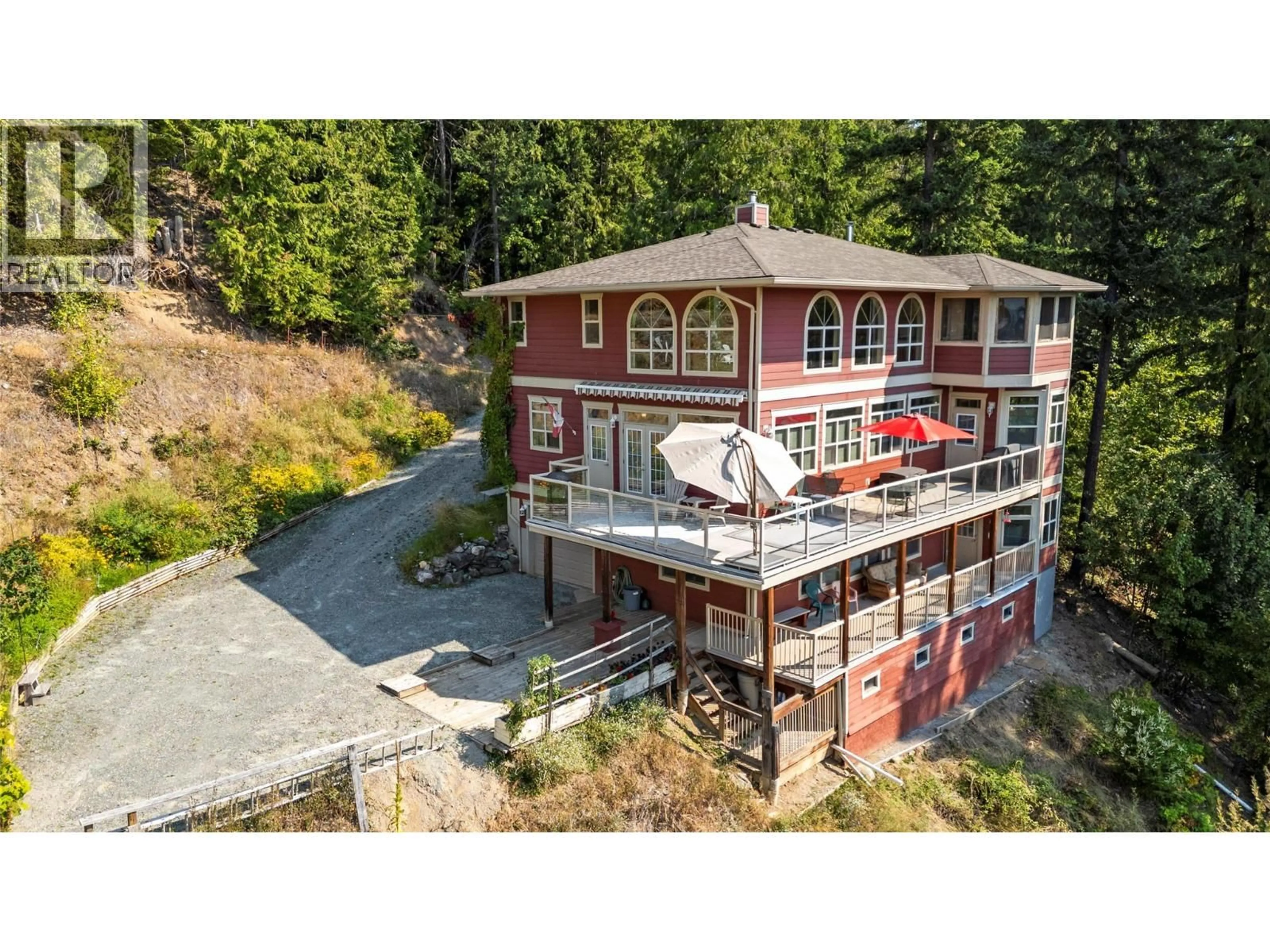 A pic from outside/outdoor area/front of a property/back of a property/a pic from drone, building for 7666 LICHEN ROAD, Anglemont British Columbia V0E1M8