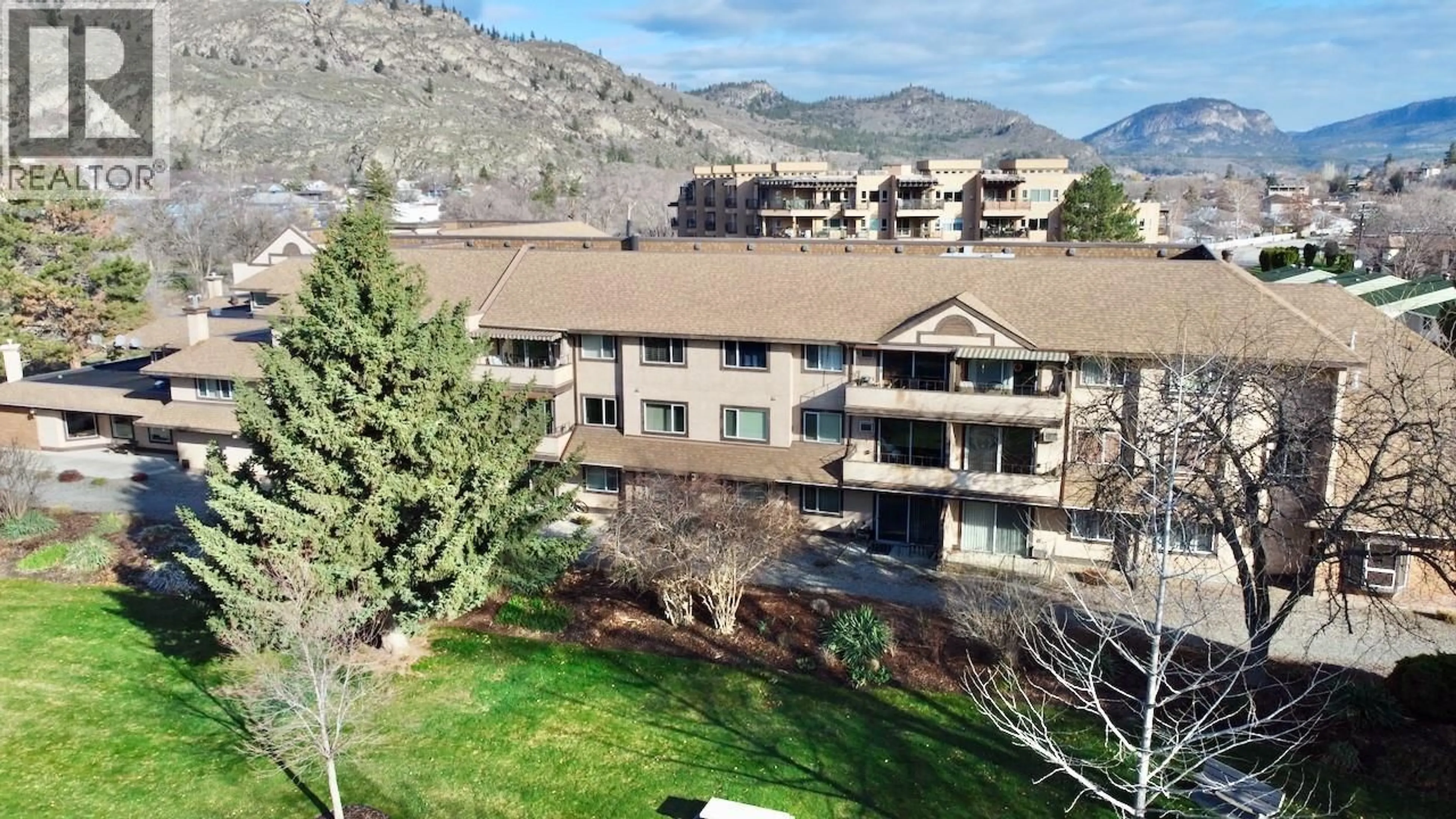 A pic from outside/outdoor area/front of a property/back of a property/a pic from drone, mountain view for 110 - 337 MCKINNEY ROAD, Oliver British Columbia V0H1T3