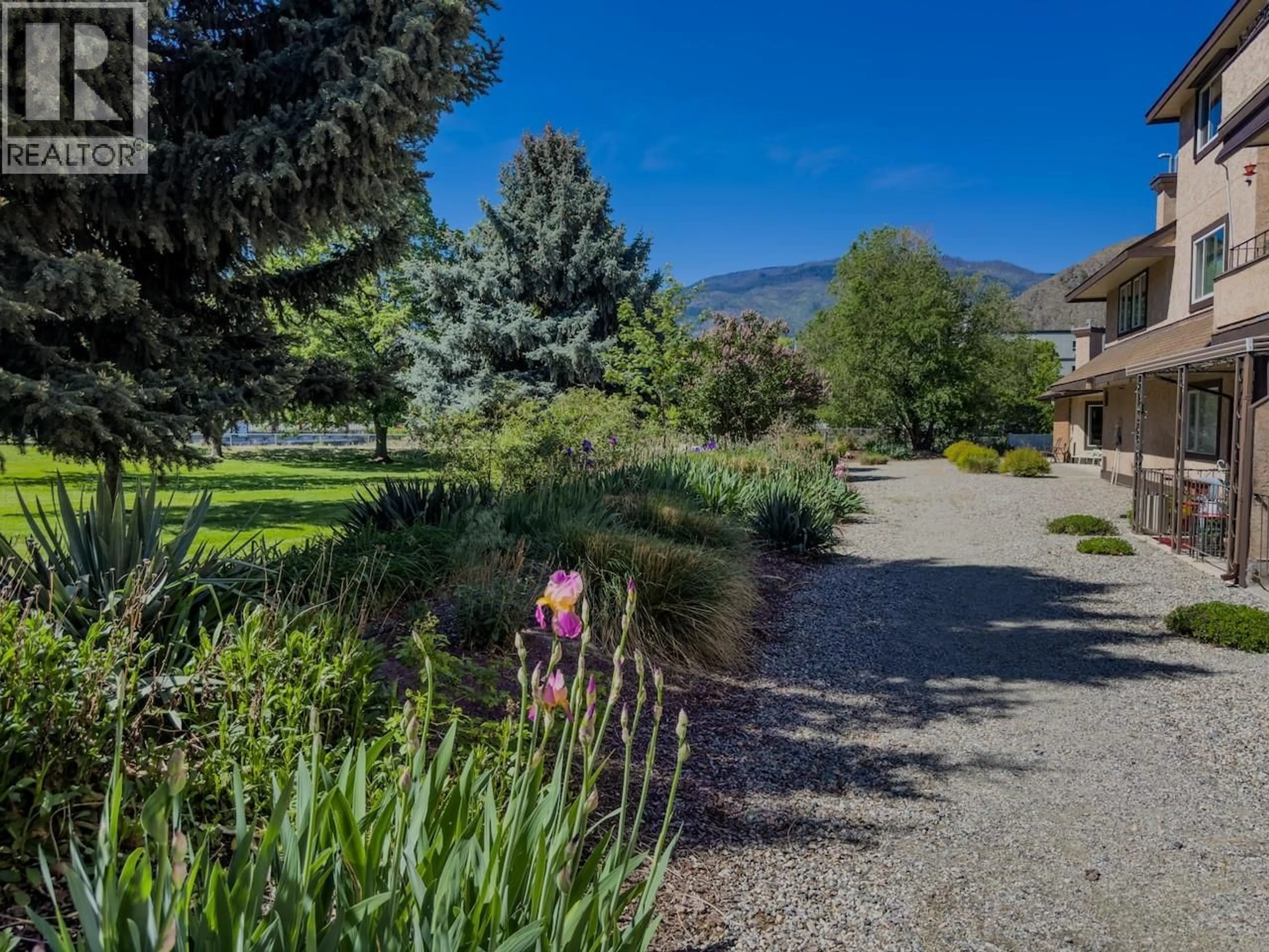 A pic from outside/outdoor area/front of a property/back of a property/a pic from drone, mountain view for 110 - 337 MCKINNEY ROAD, Oliver British Columbia V0H1T3