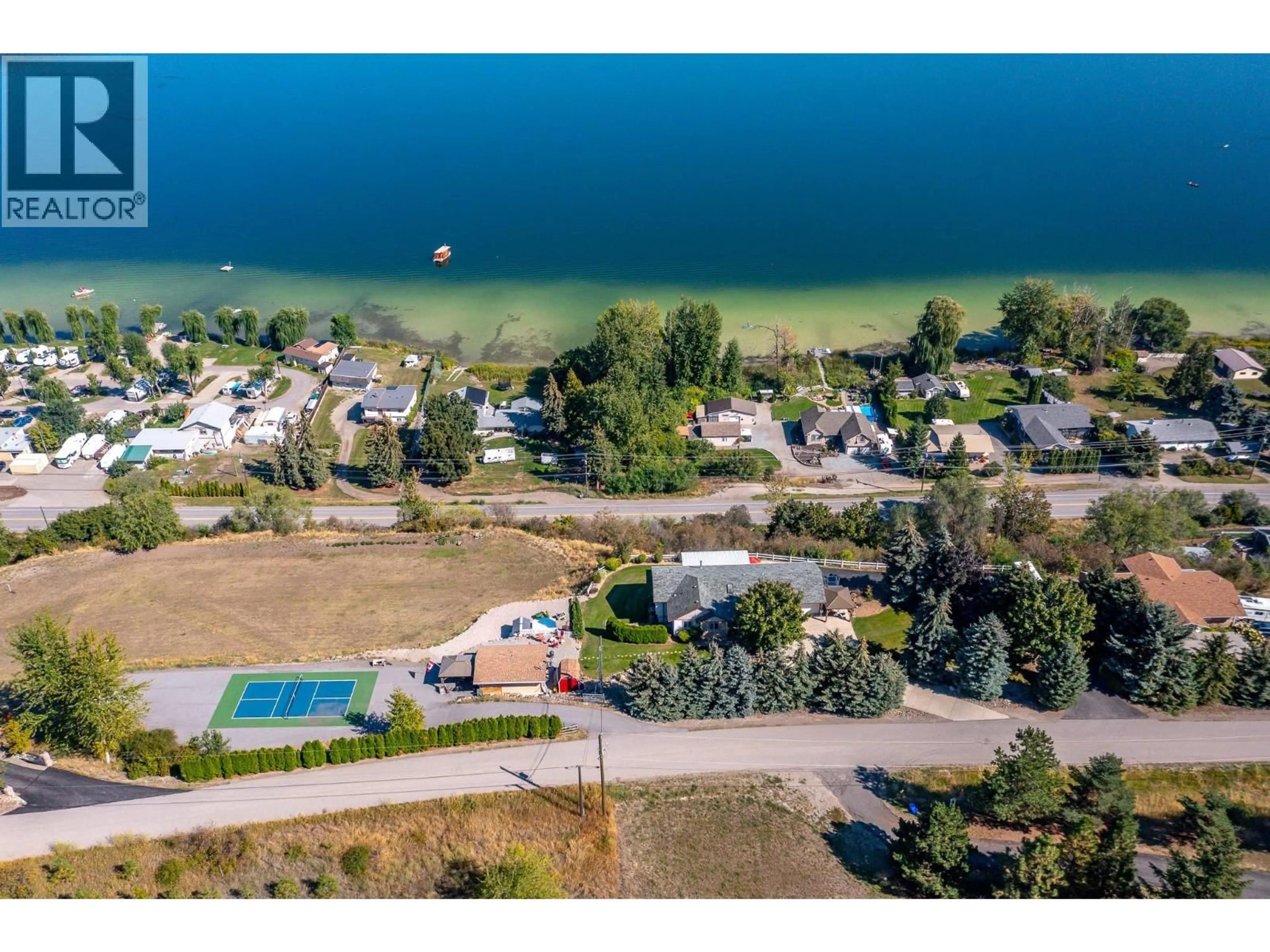 A pic from outside/outdoor area/front of a property/back of a property/a pic from drone, water/lake/river/ocean view for 7199 BREMMER ROAD, Vernon British Columbia V1H1W6