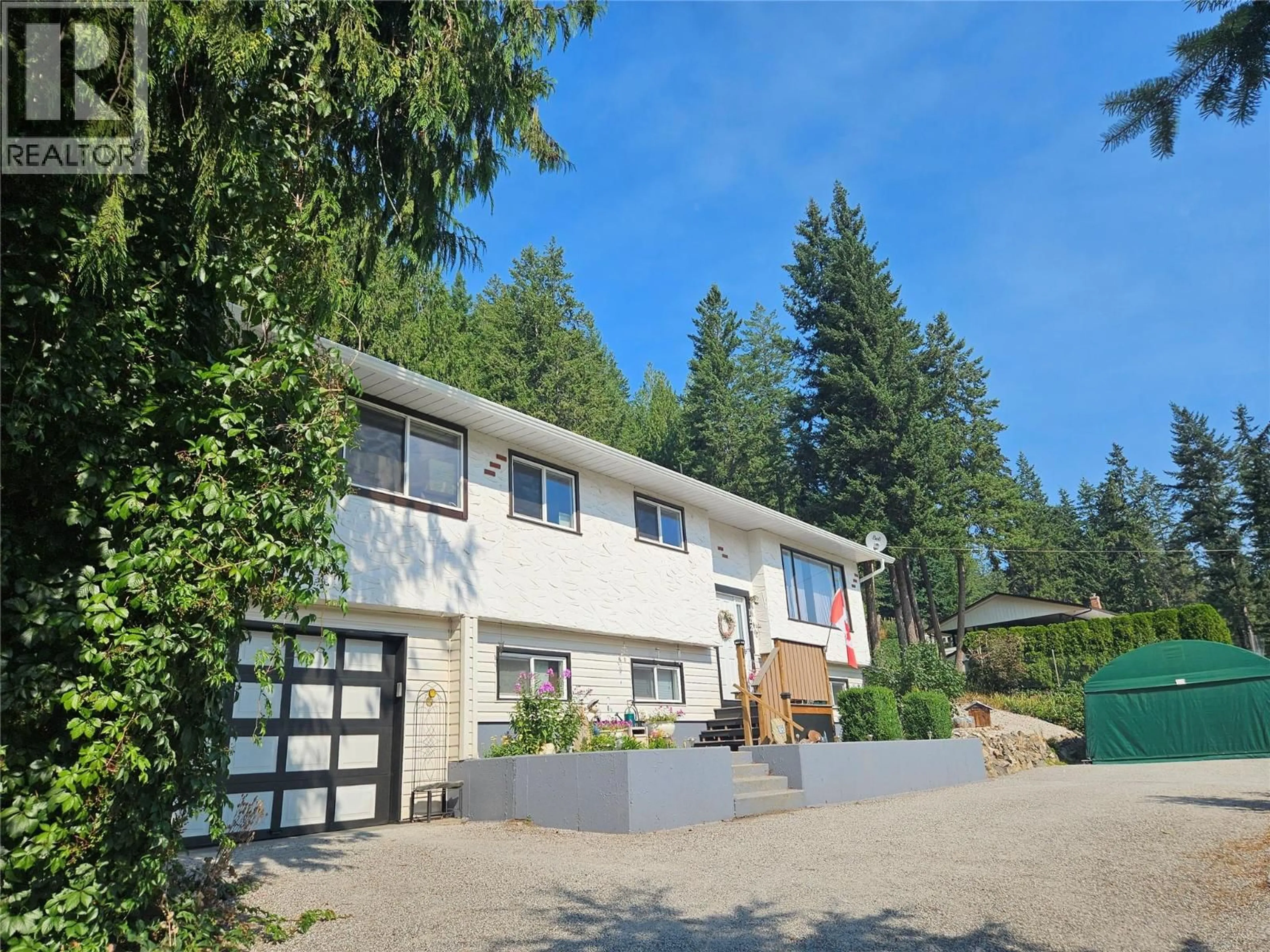 A pic from outside/outdoor area/front of a property/back of a property/a pic from drone, unknown for 122 TIMBERLANE ROAD, Enderby British Columbia V4Y4G1
