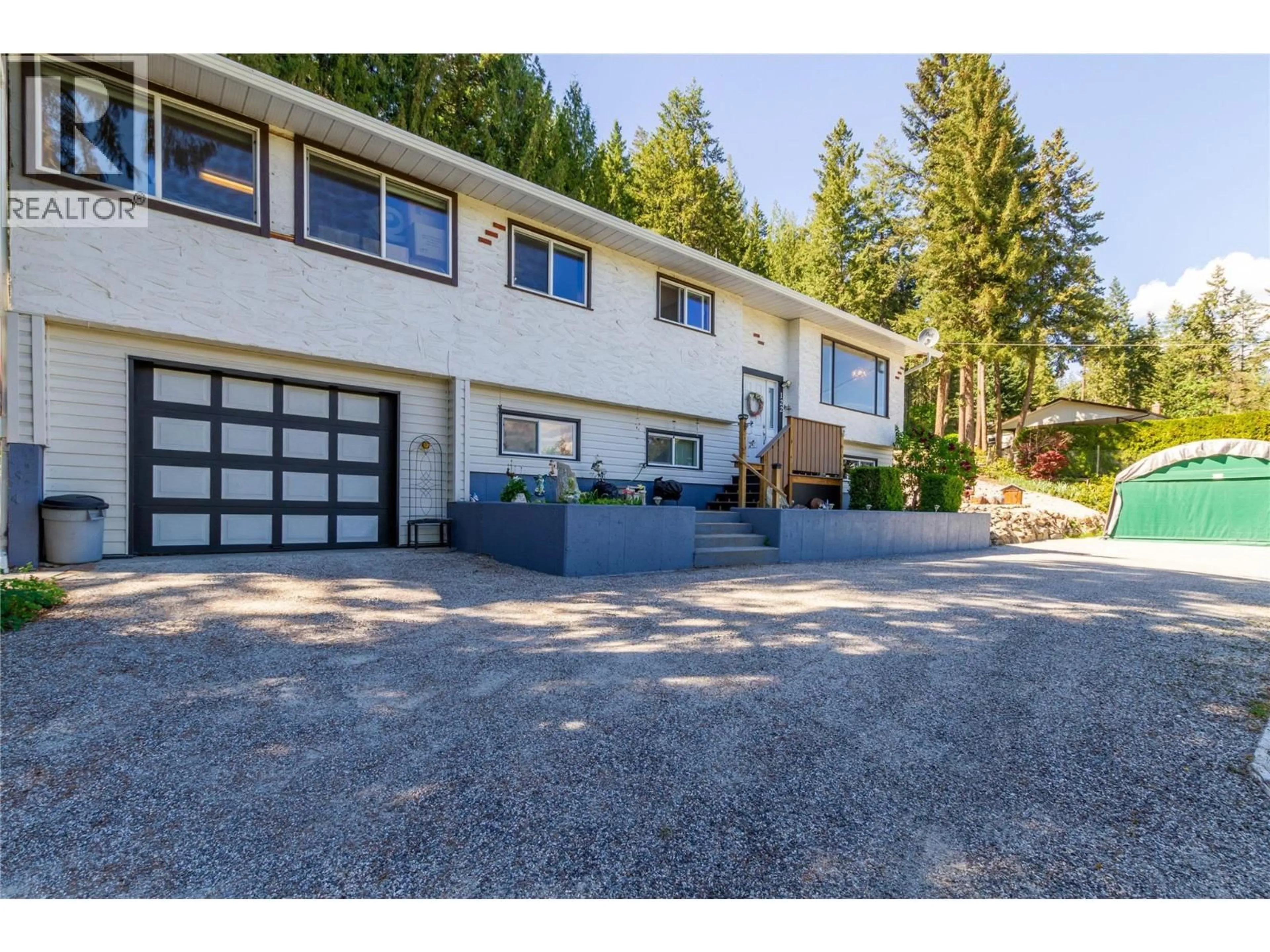 A pic from outside/outdoor area/front of a property/back of a property/a pic from drone, unknown for 122 TIMBERLANE ROAD, Enderby British Columbia V4Y4G1