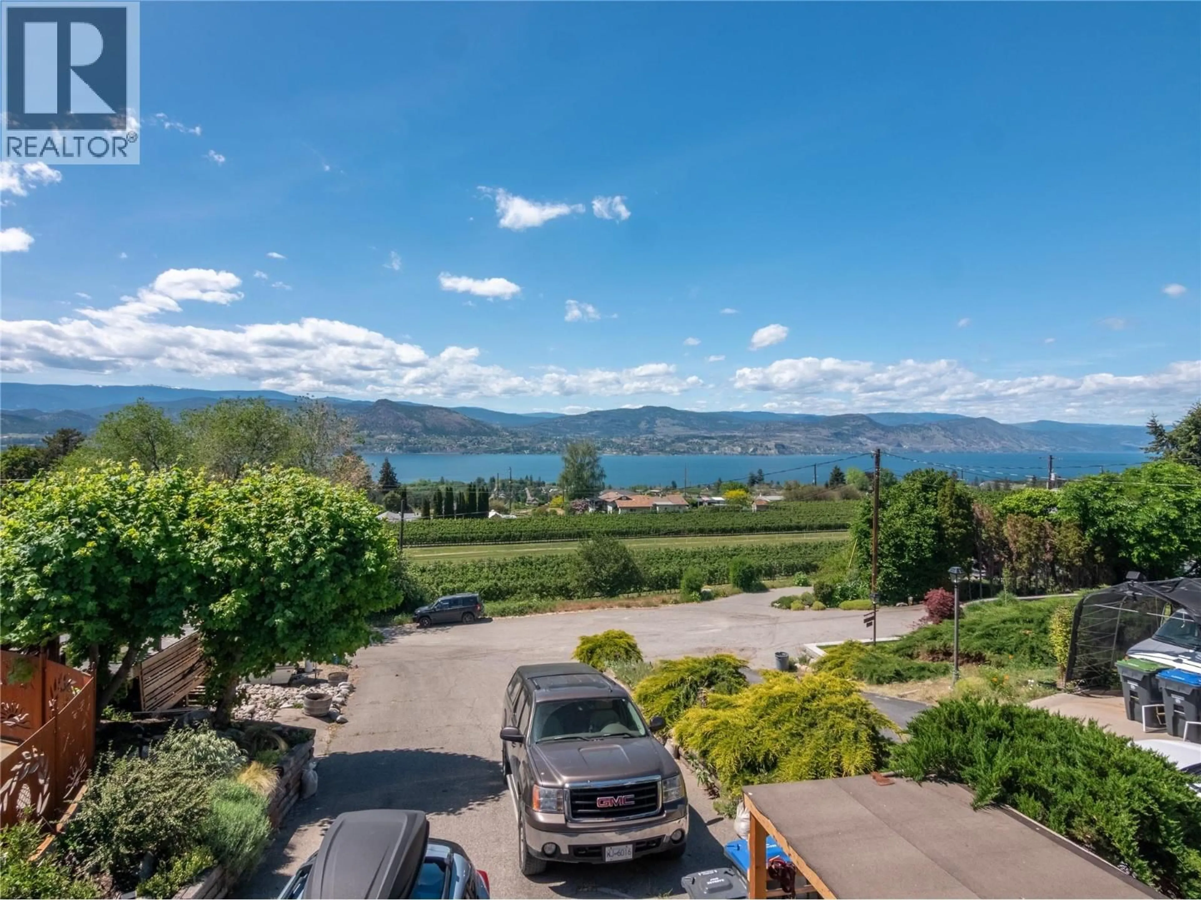 A pic from outside/outdoor area/front of a property/back of a property/a pic from drone, water/lake/river/ocean view for 3830 ALBRECHT ROAD, Naramata British Columbia V0H1N1