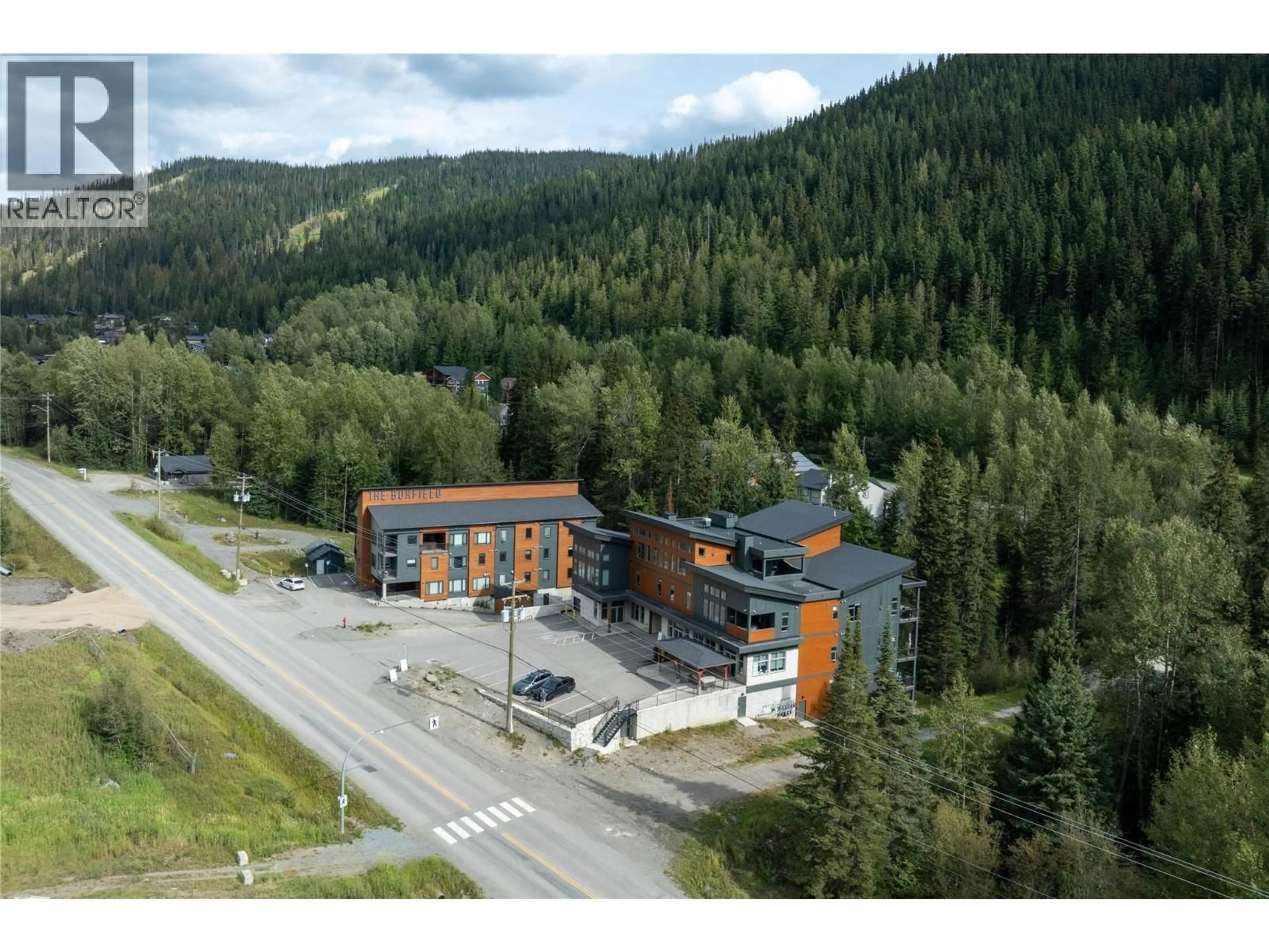 A pic from outside/outdoor area/front of a property/back of a property/a pic from drone, mountain view for A & B - 1130 SUN PEAKS ROAD, Sun Peaks British Columbia V0E5N0