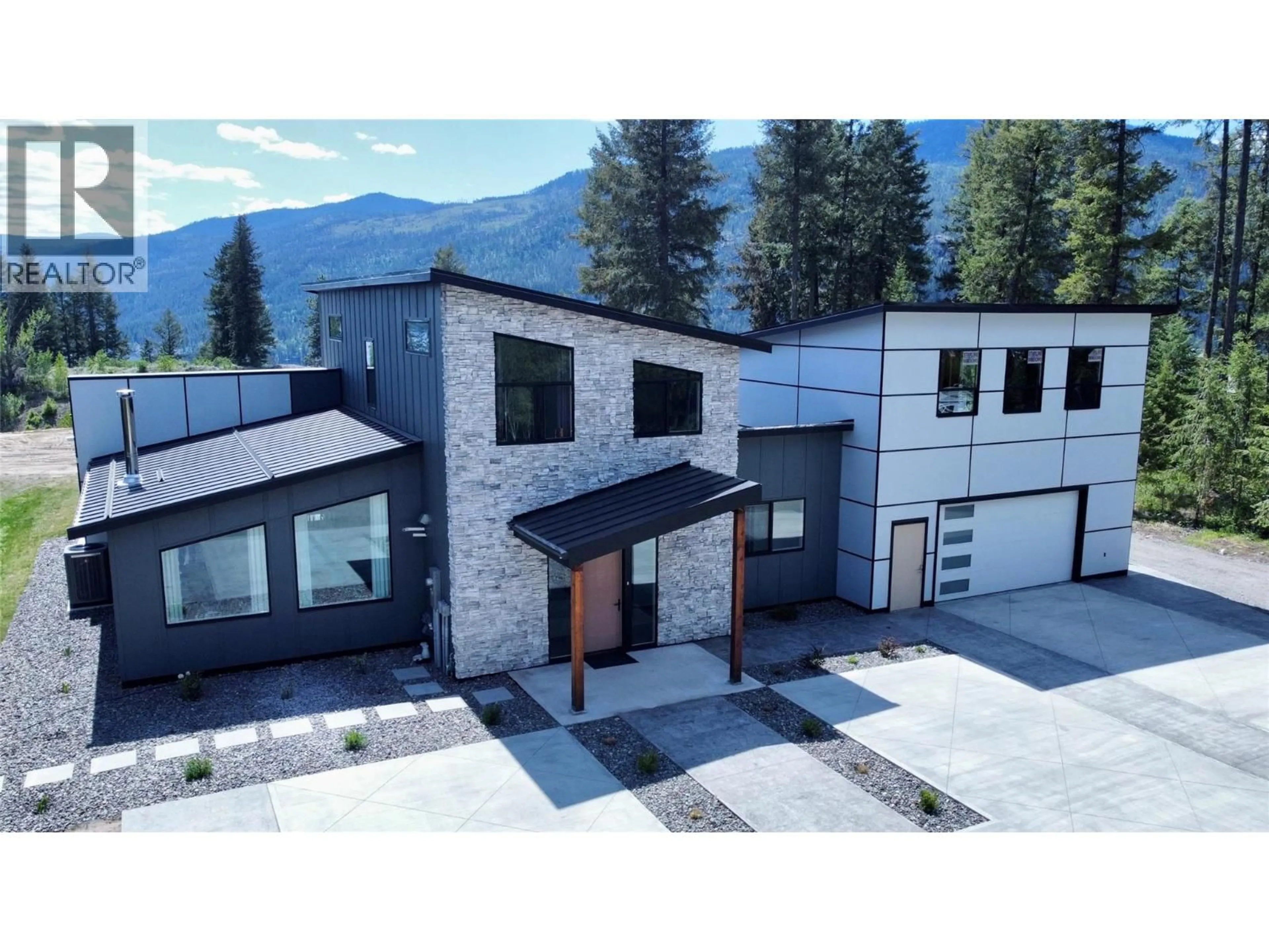 A pic from outside/outdoor area/front of a property/back of a property/a pic from drone, mountain view for 155 CAITLIN ROAD, Christina Lake British Columbia V0H1E3