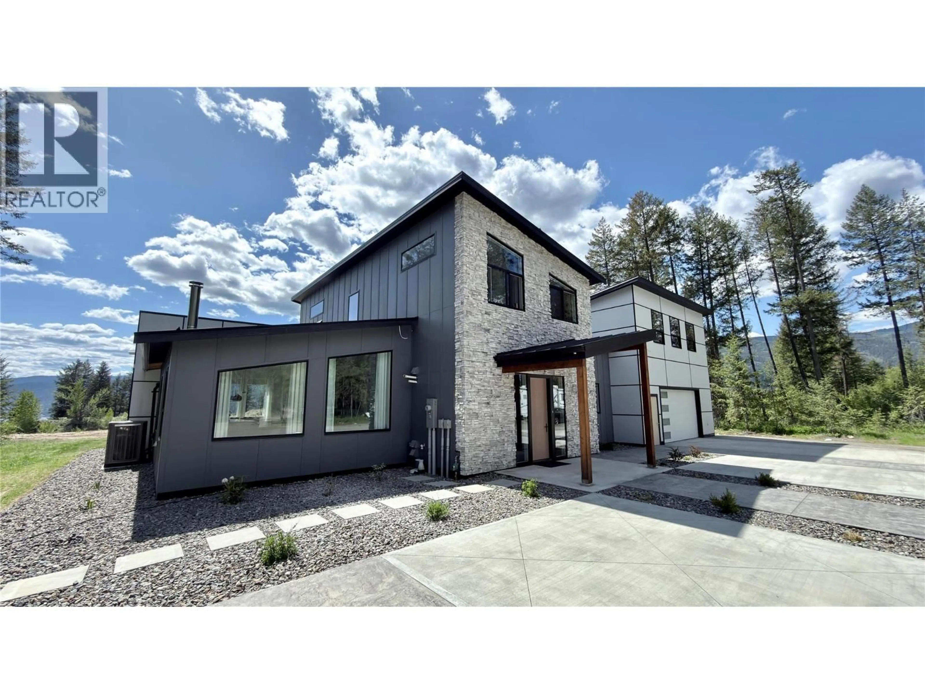 Home with brick exterior material, mountain view for 155 CAITLIN ROAD, Christina Lake British Columbia V0H1E3