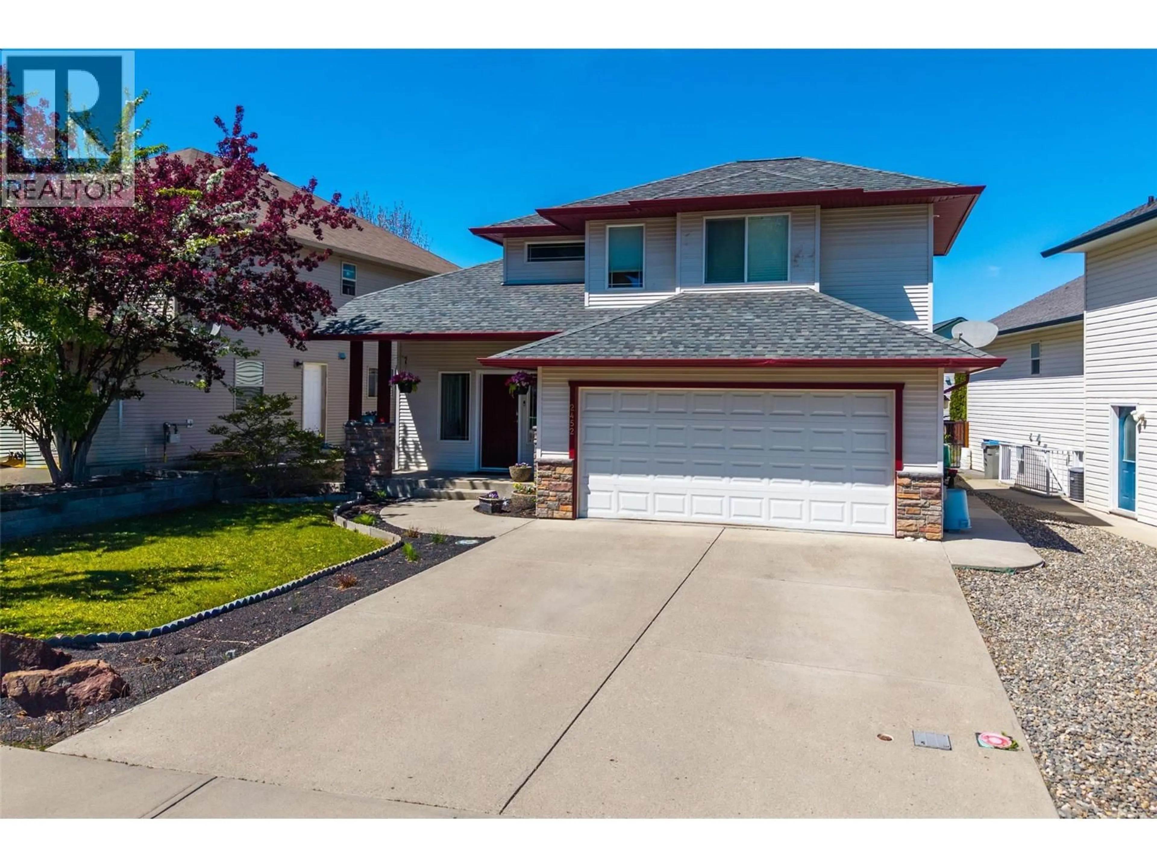 Home with vinyl exterior material, street for 2452 ABBEYGLEN WAY, Kamloops British Columbia V1S1A5