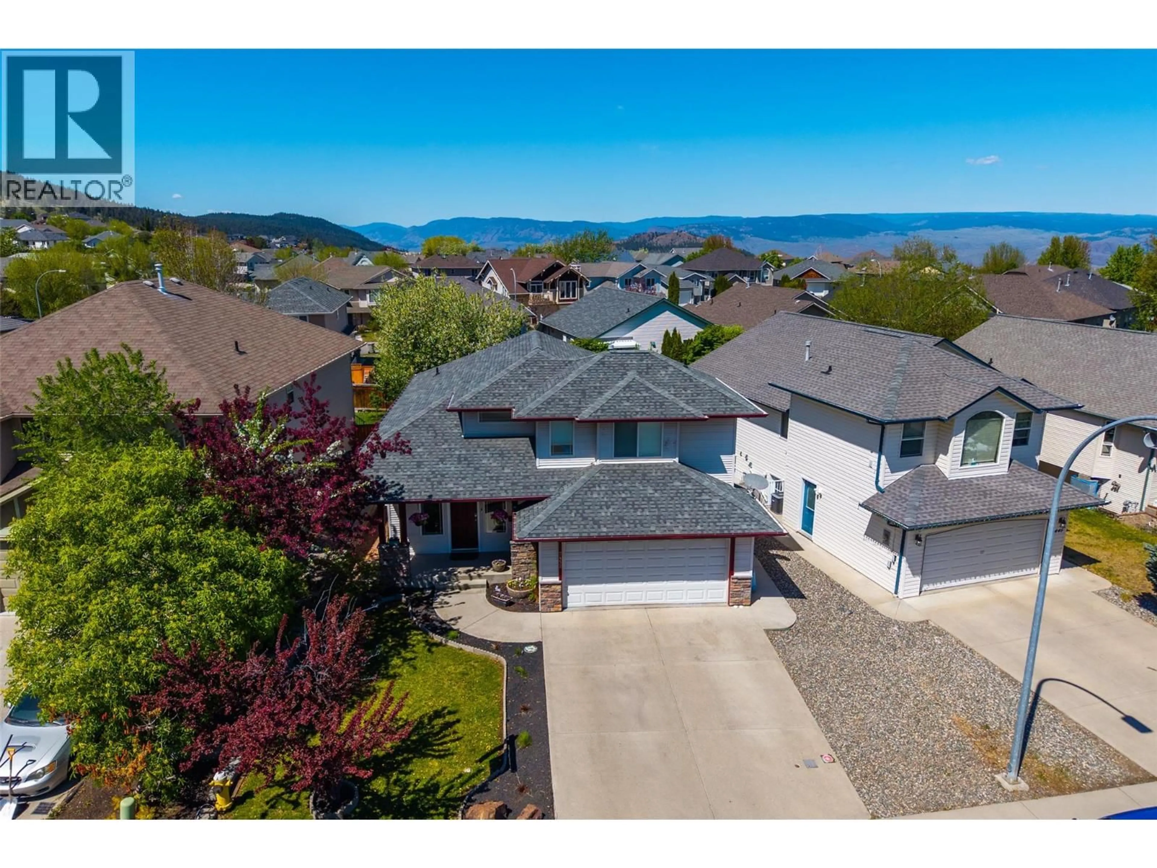 A pic from outside/outdoor area/front of a property/back of a property/a pic from drone, water/lake/river/ocean view for 2452 ABBEYGLEN WAY, Kamloops British Columbia V1S1A5