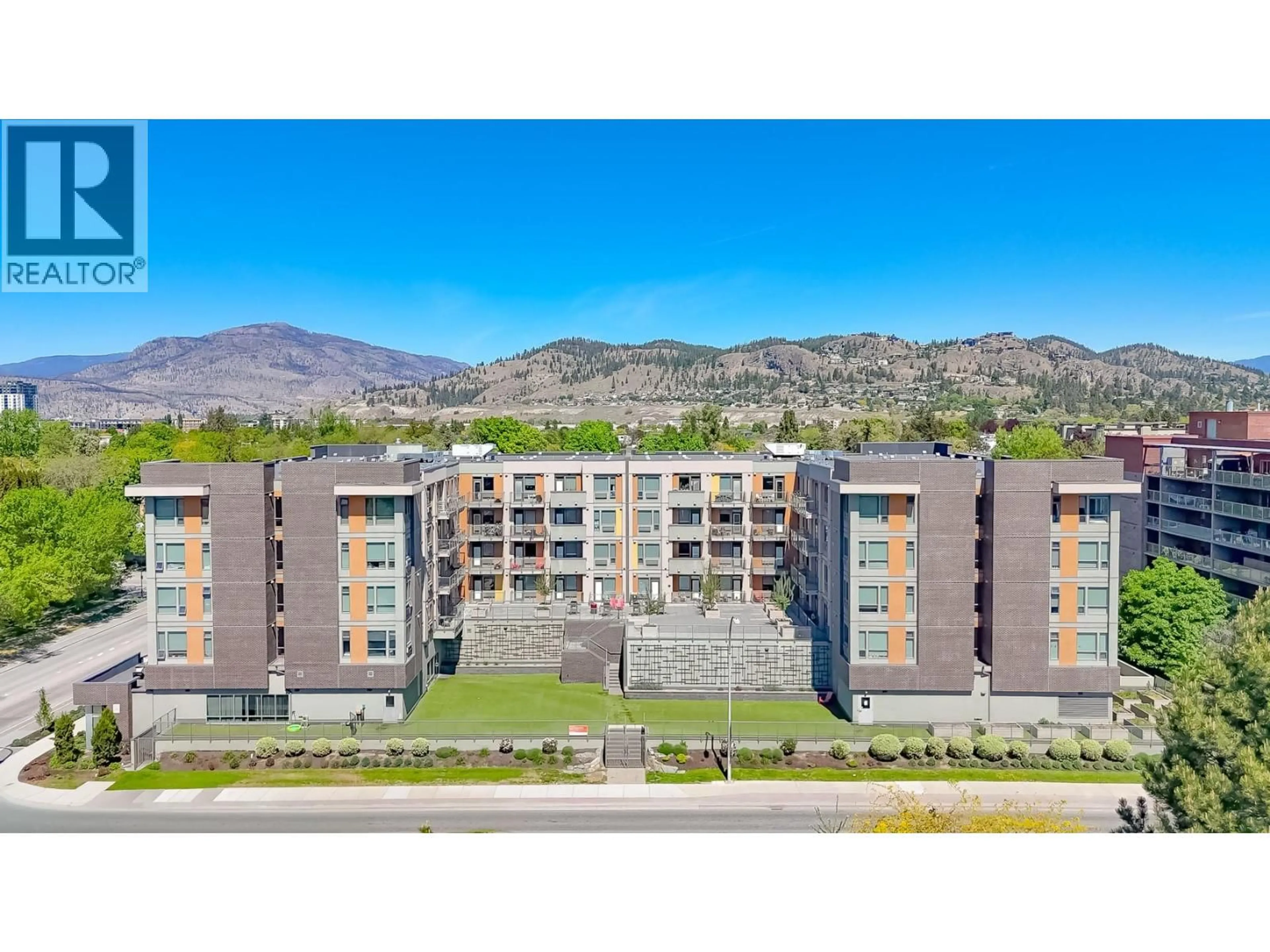 A pic from outside/outdoor area/front of a property/back of a property/a pic from drone, mountain view for 614 - 925 LEON AVENUE, Kelowna British Columbia V1Y0E5