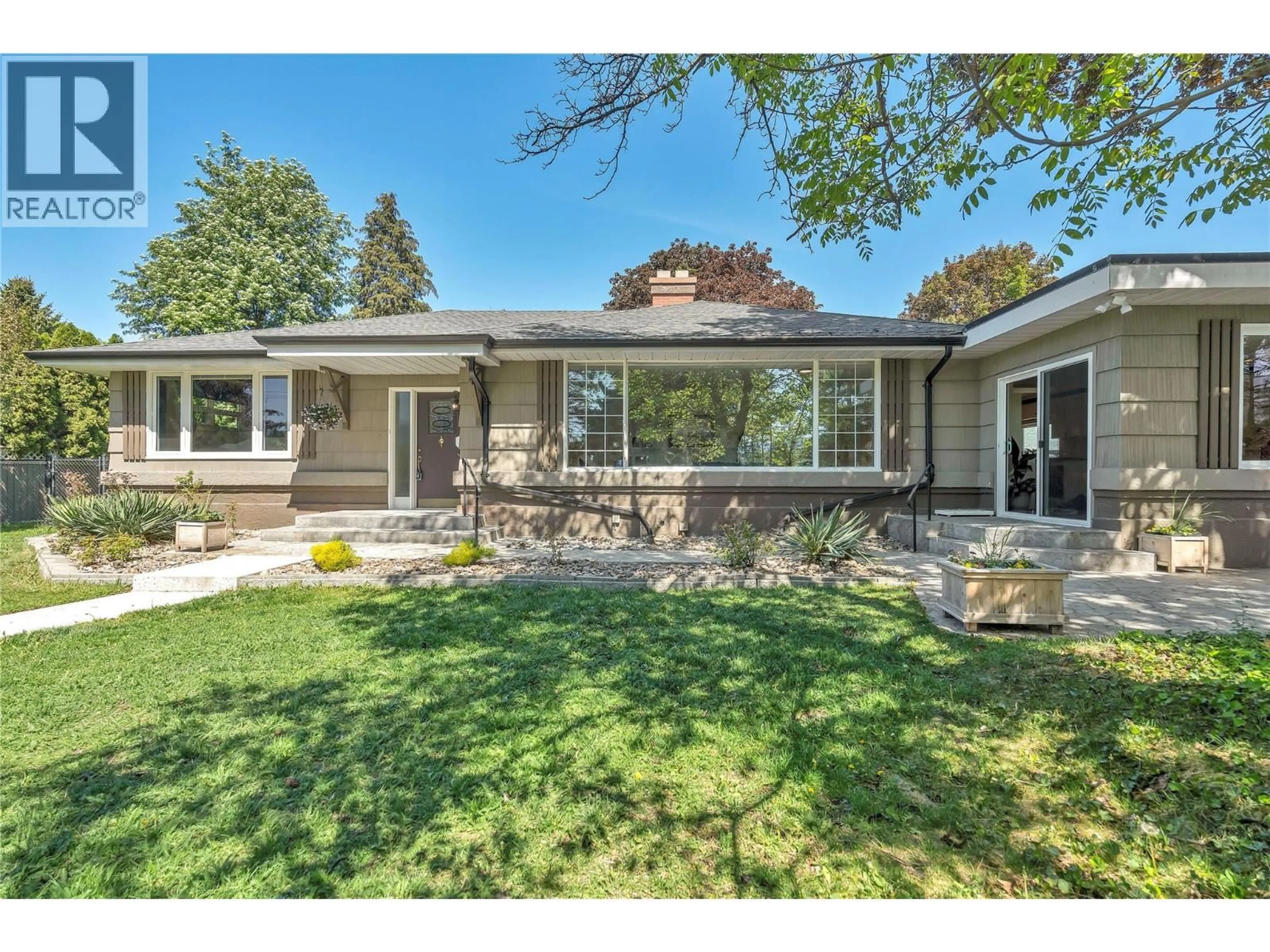 Home with vinyl exterior material, street for 1135 JOHNSON ROAD, Penticton British Columbia V2A1W6