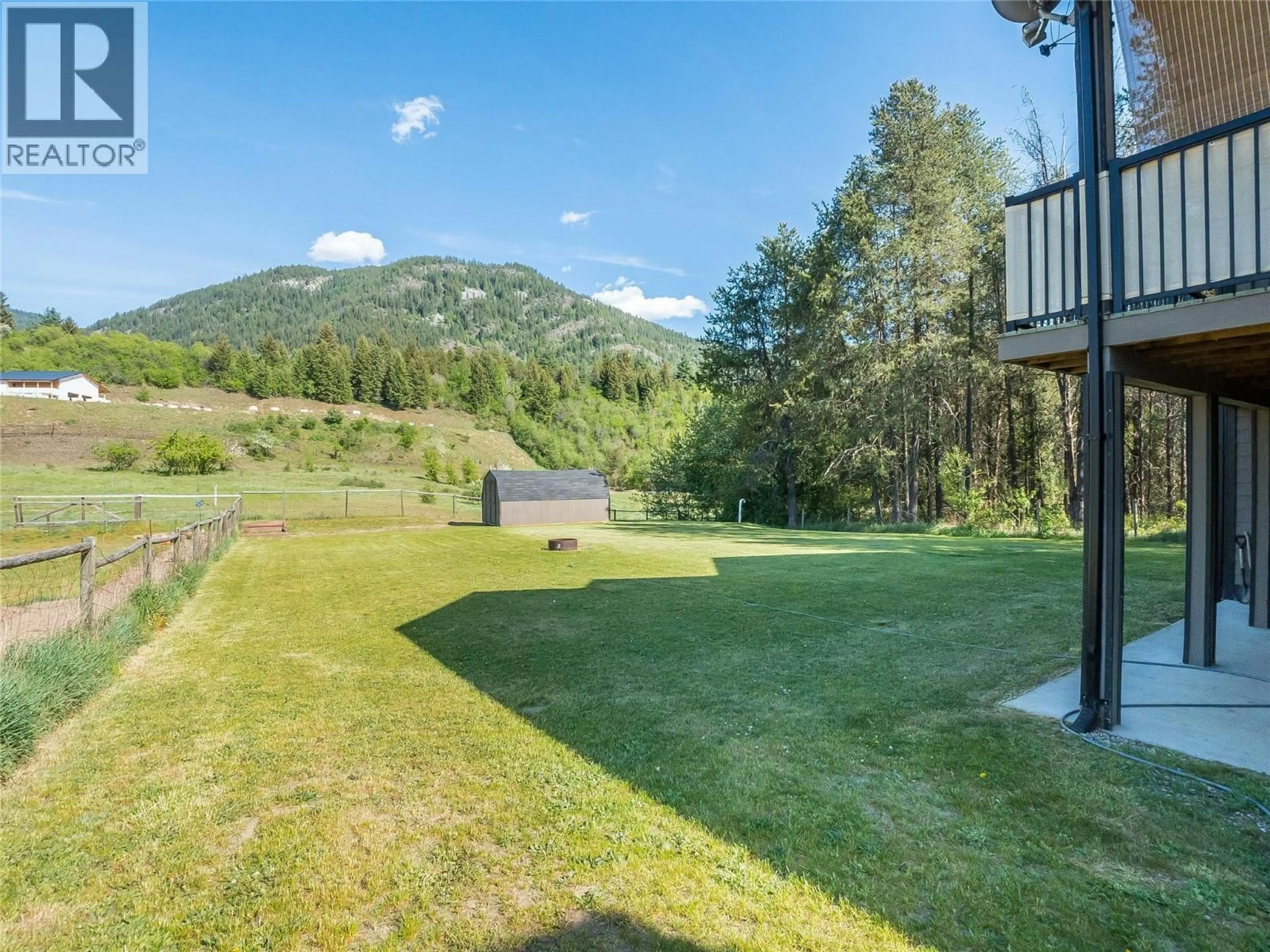 A pic from outside/outdoor area/front of a property/back of a property/a pic from drone, mountain view for 892 WATERLOO ROAD, Castlegar British Columbia V1N4K8