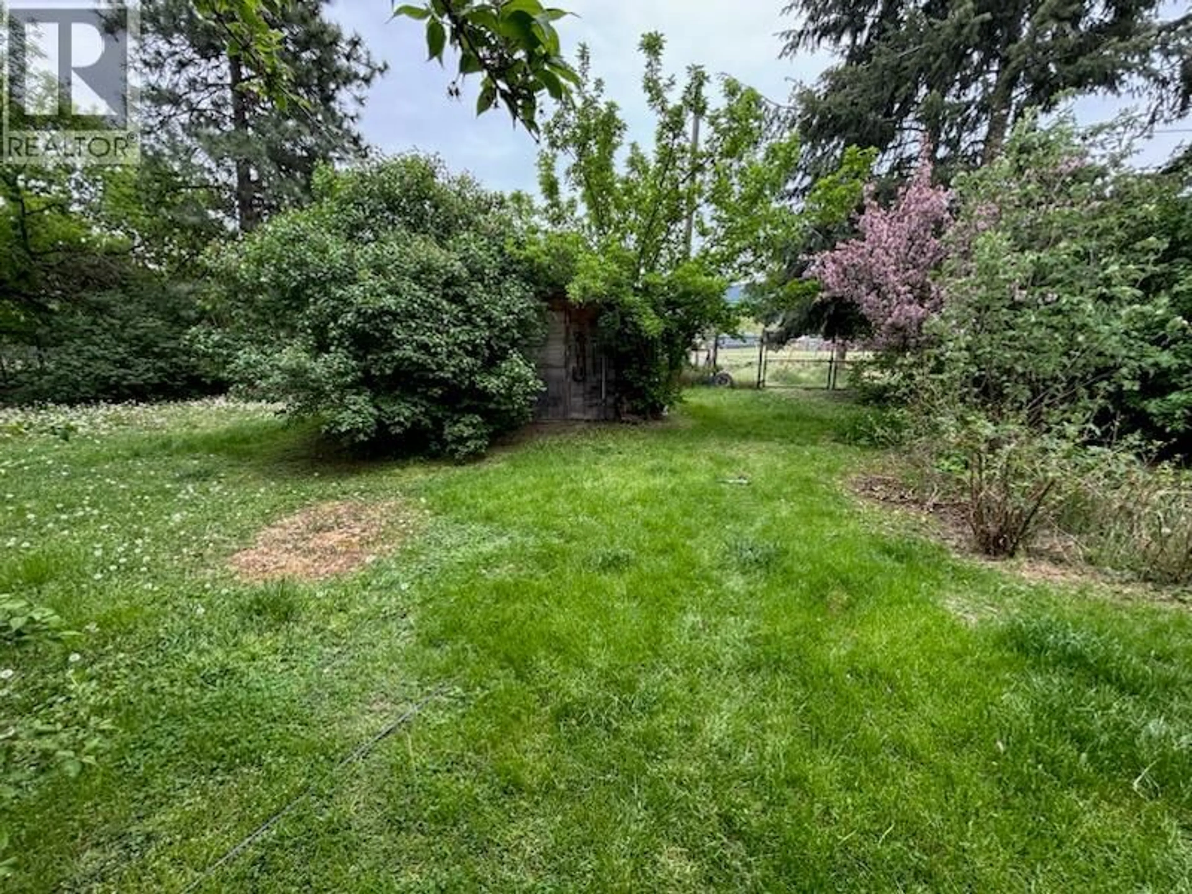 A pic from outside/outdoor area/front of a property/back of a property/a pic from drone, forest/trees view for 6020 18TH STREET, Grand Forks British Columbia V0H1H0
