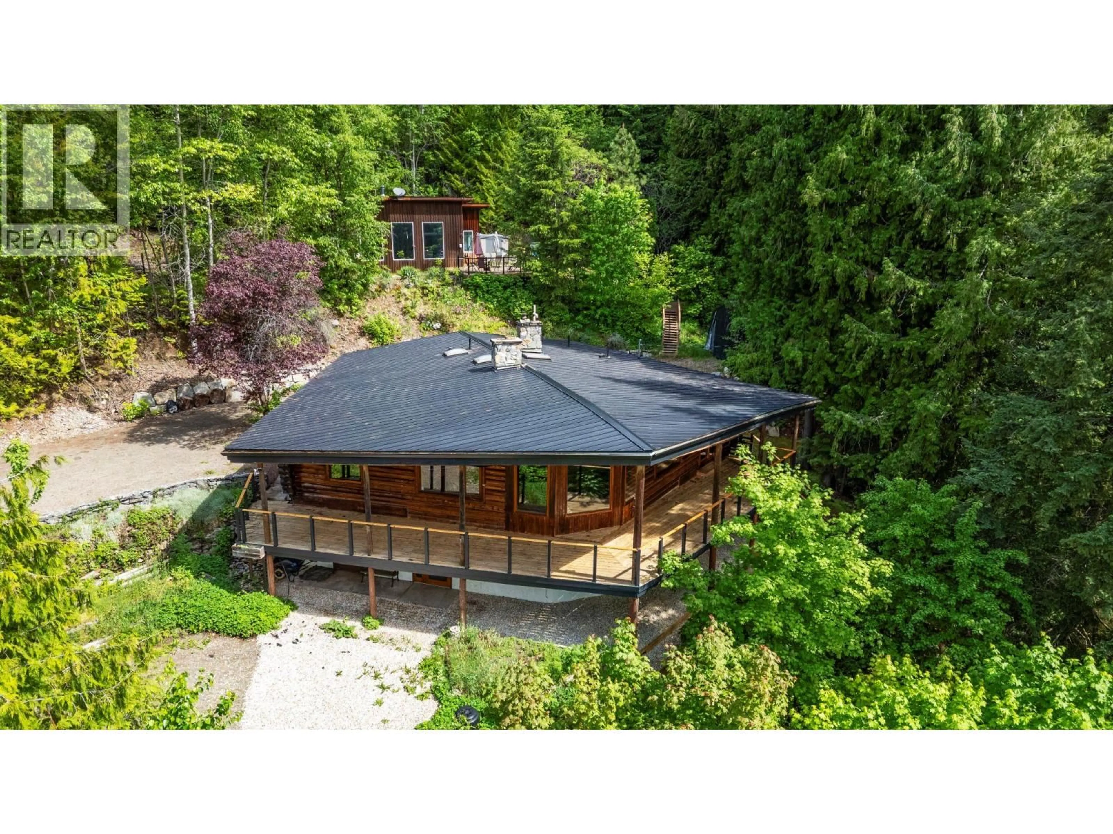A pic from outside/outdoor area/front of a property/back of a property/a pic from drone, unknown for 5773 SUNNYBRAE CANOE POINT ROAD, Tappen British Columbia V0E2X1