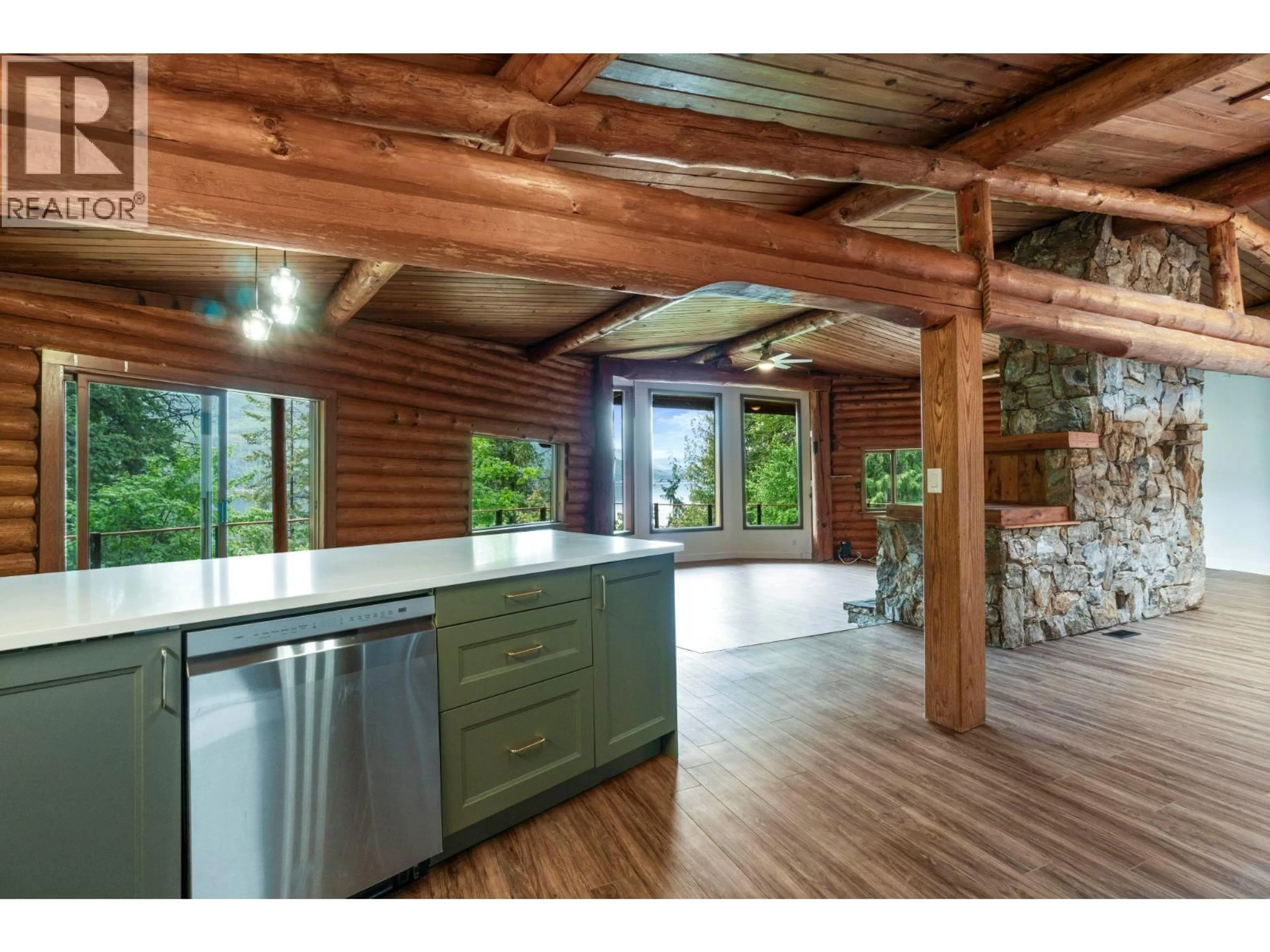 Open concept kitchen, wood/laminate floor for 5773 SUNNYBRAE CANOE POINT ROAD, Tappen British Columbia V0E2X1