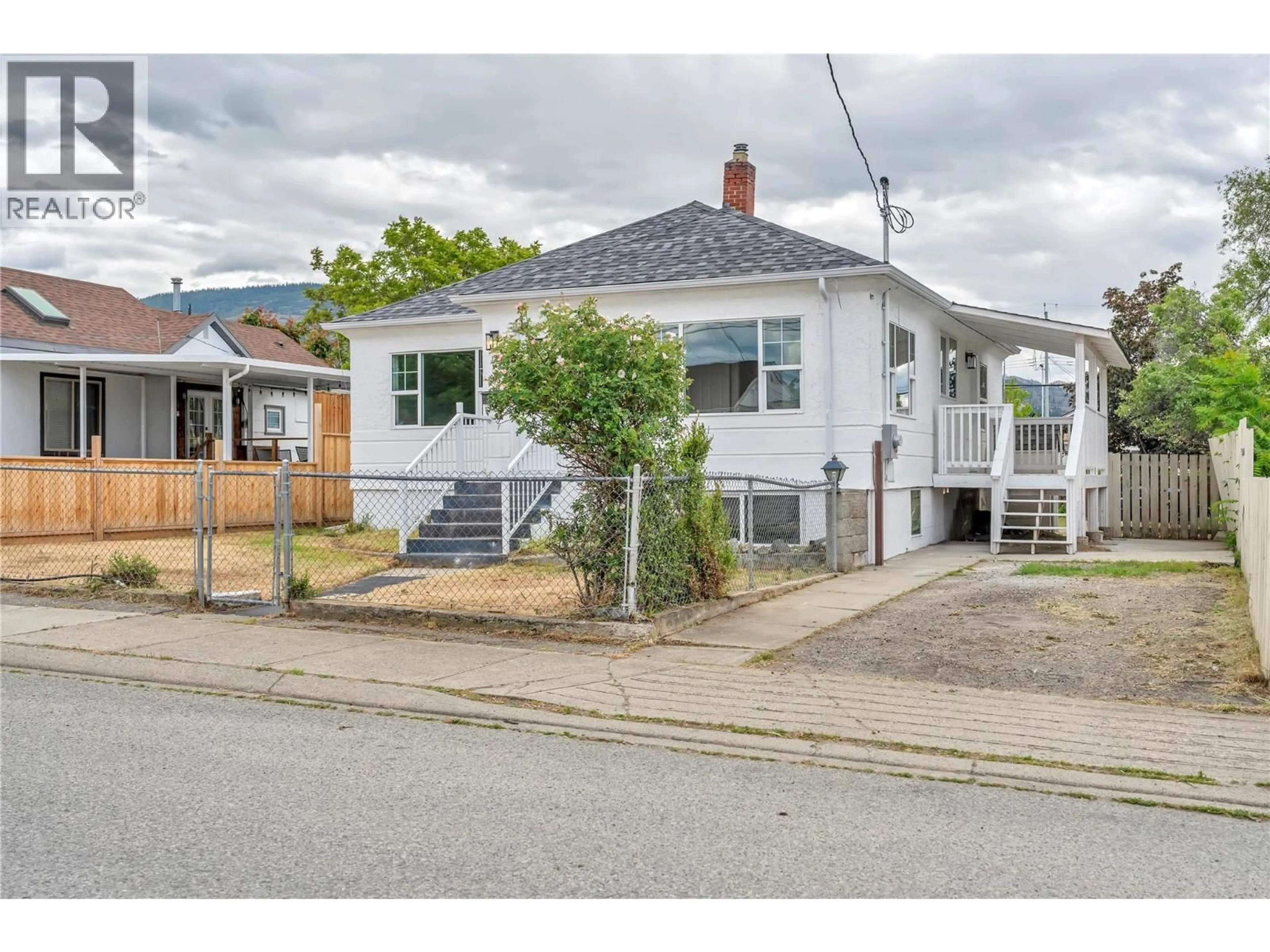 A pic from outside/outdoor area/front of a property/back of a property/a pic from drone, street for 460 PENTICTON AVENUE, Penticton British Columbia V2A2M6