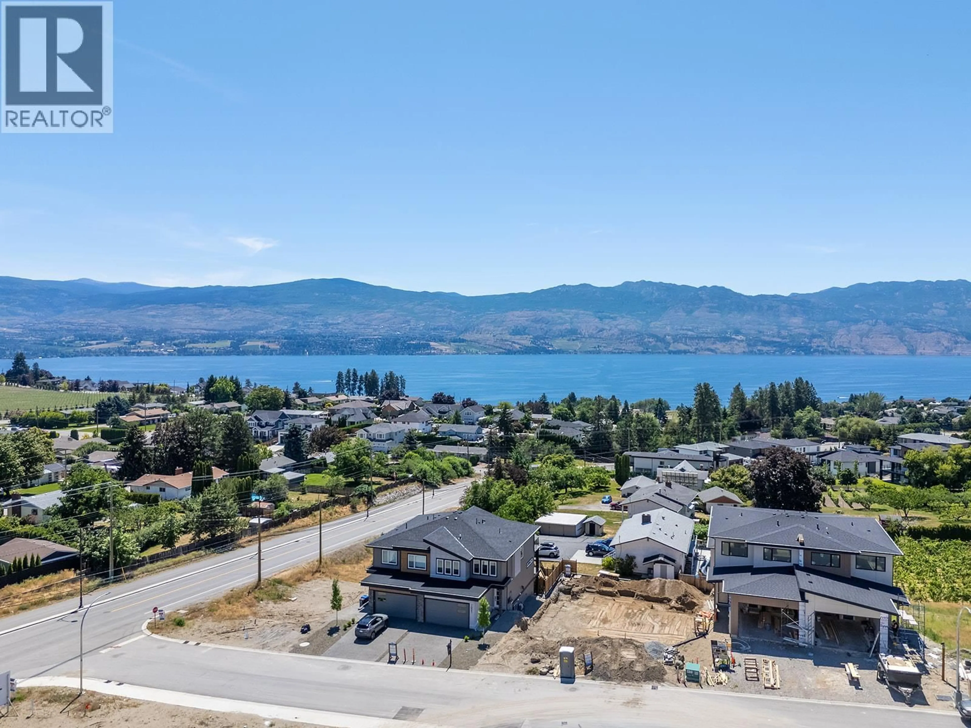 A pic from outside/outdoor area/front of a property/back of a property/a pic from drone, water/lake/river/ocean view for 1025 KITSON COURT, West Kelowna British Columbia V1Z2G7