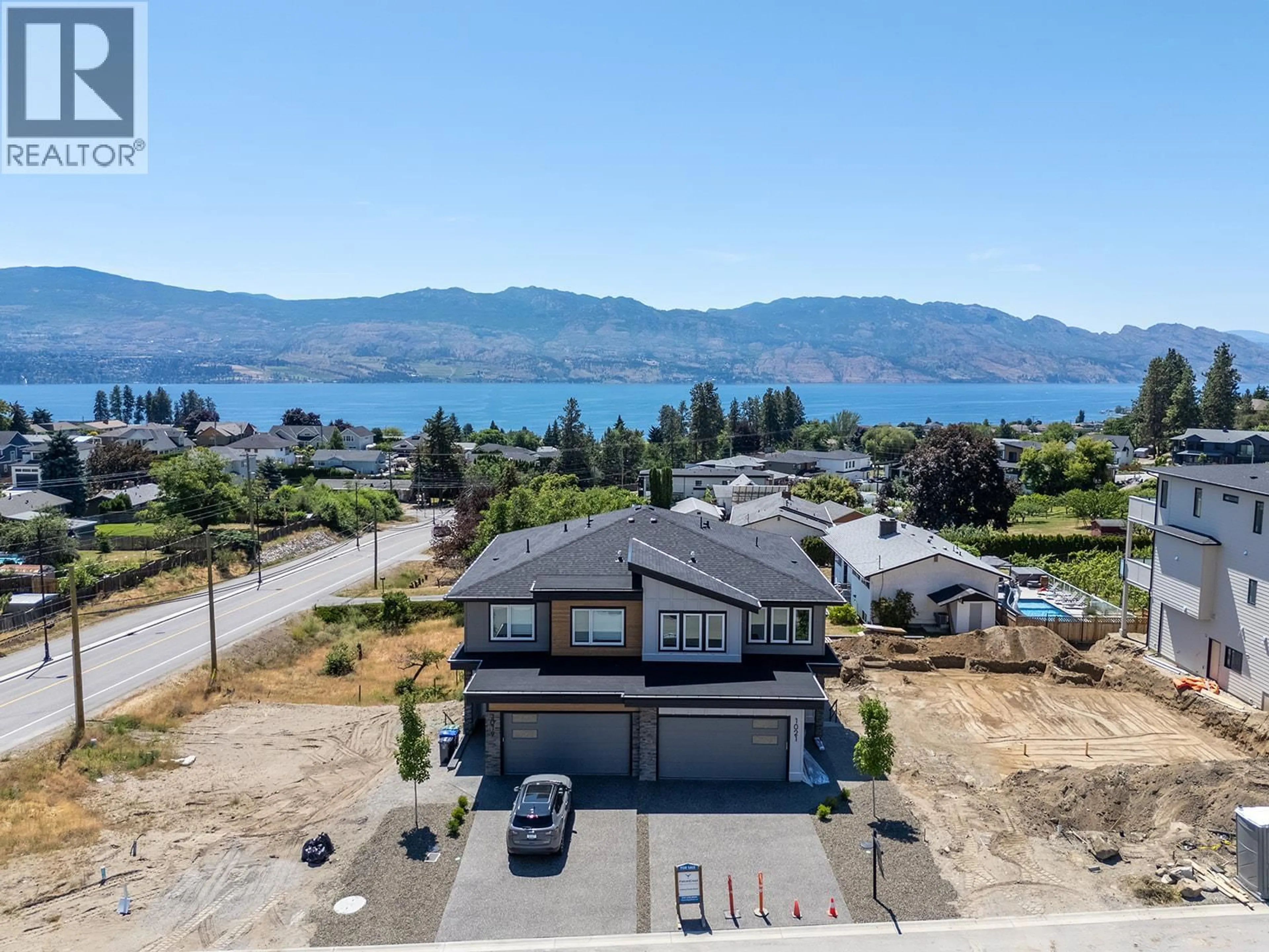 A pic from outside/outdoor area/front of a property/back of a property/a pic from drone, water/lake/river/ocean view for 1025 KITSON COURT, West Kelowna British Columbia V1Z2G7