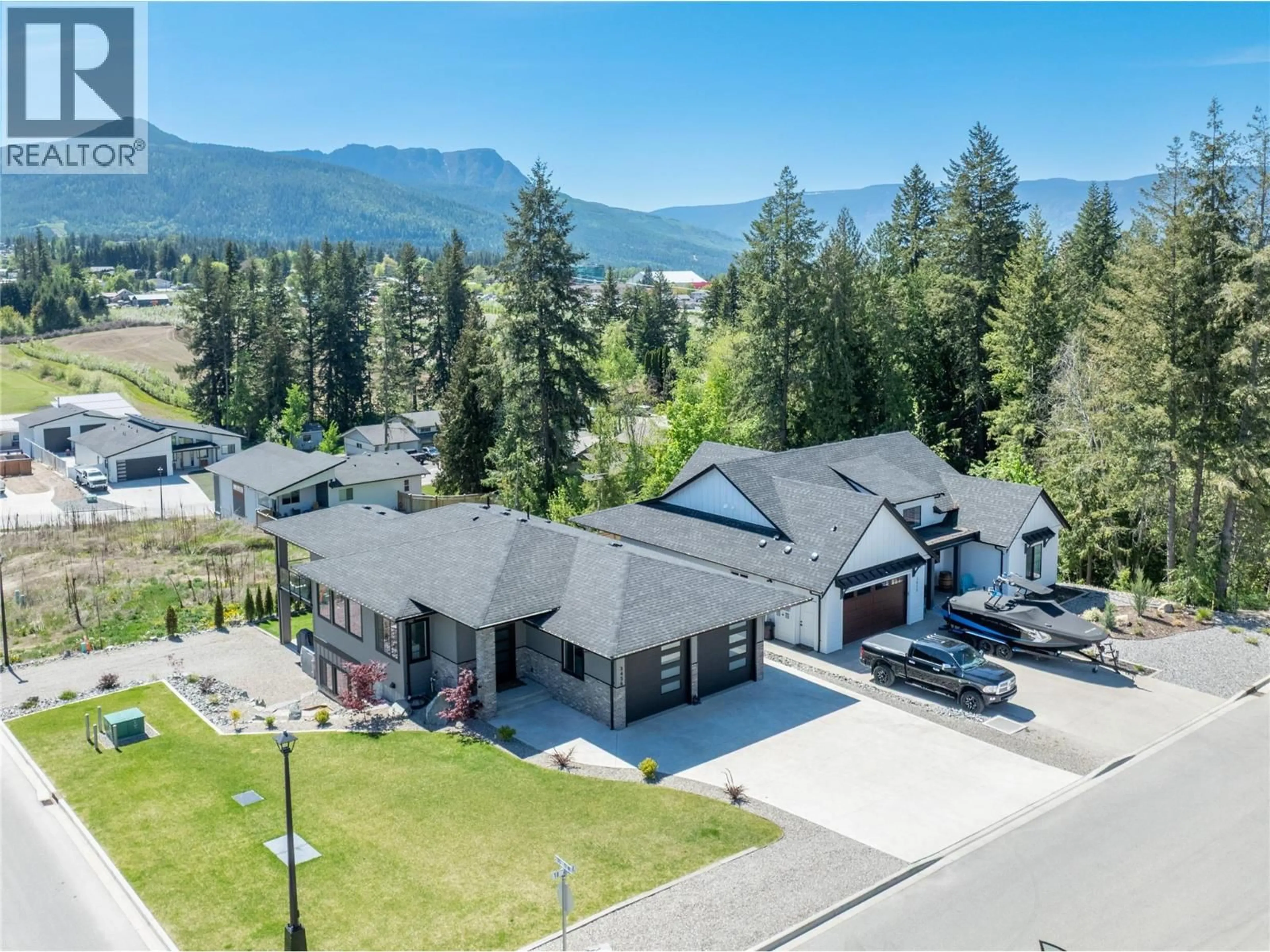 A pic from outside/outdoor area/front of a property/back of a property/a pic from drone, mountain view for 3456 18 AVENUE NORTHEAST, Salmon Arm British Columbia V1E1M9