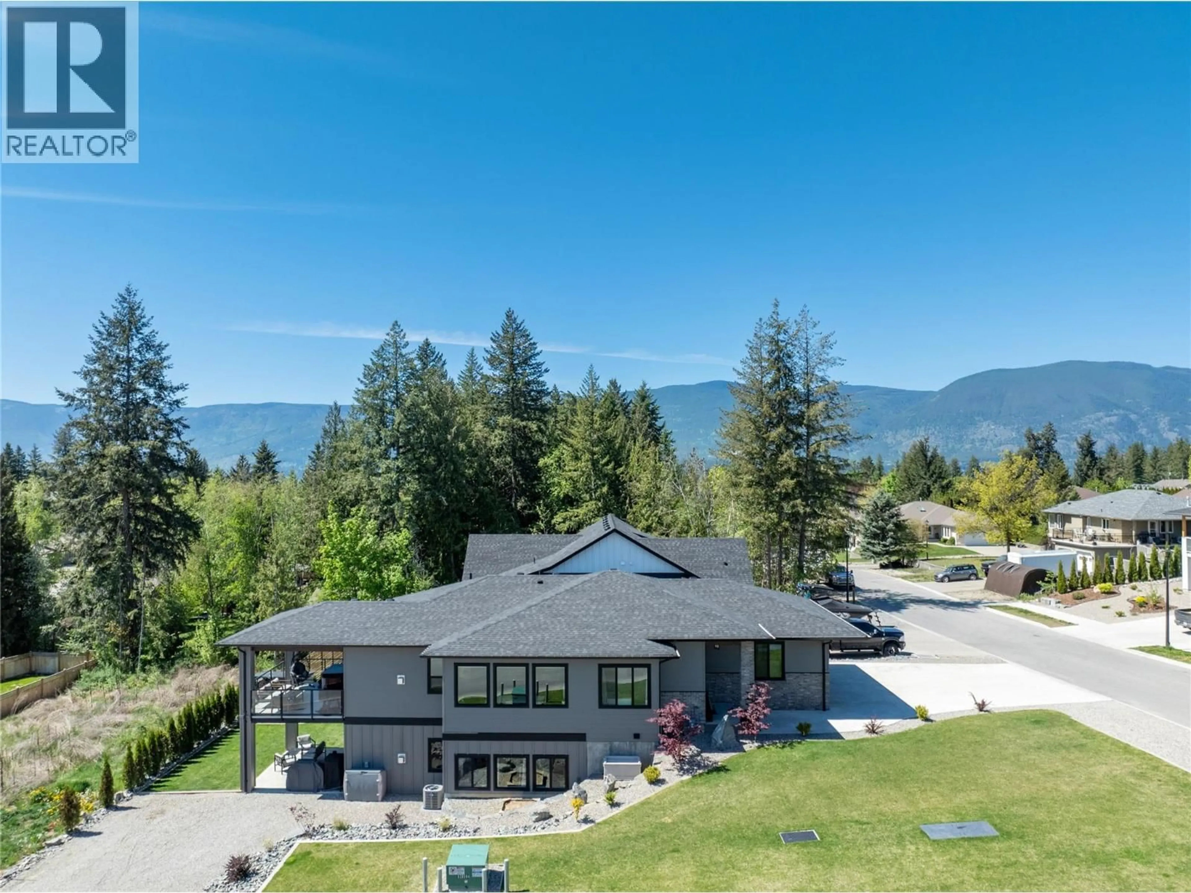 A pic from outside/outdoor area/front of a property/back of a property/a pic from drone, mountain view for 3456 18 AVENUE NORTHEAST, Salmon Arm British Columbia V1E1M9