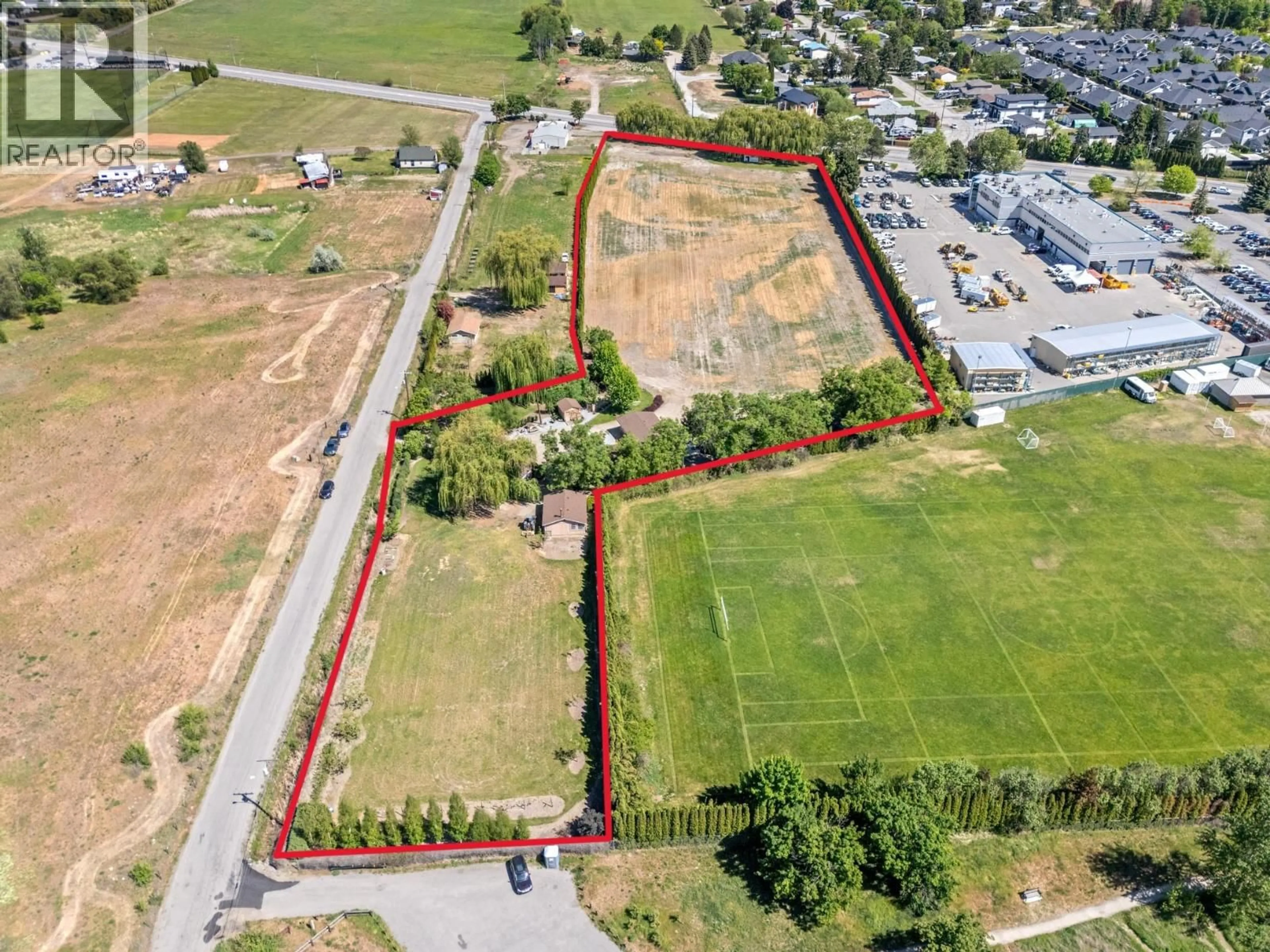 A pic from outside/outdoor area/front of a property/back of a property/a pic from drone, street for 1789 MUNSON ROAD, Kelowna British Columbia V1W2G8