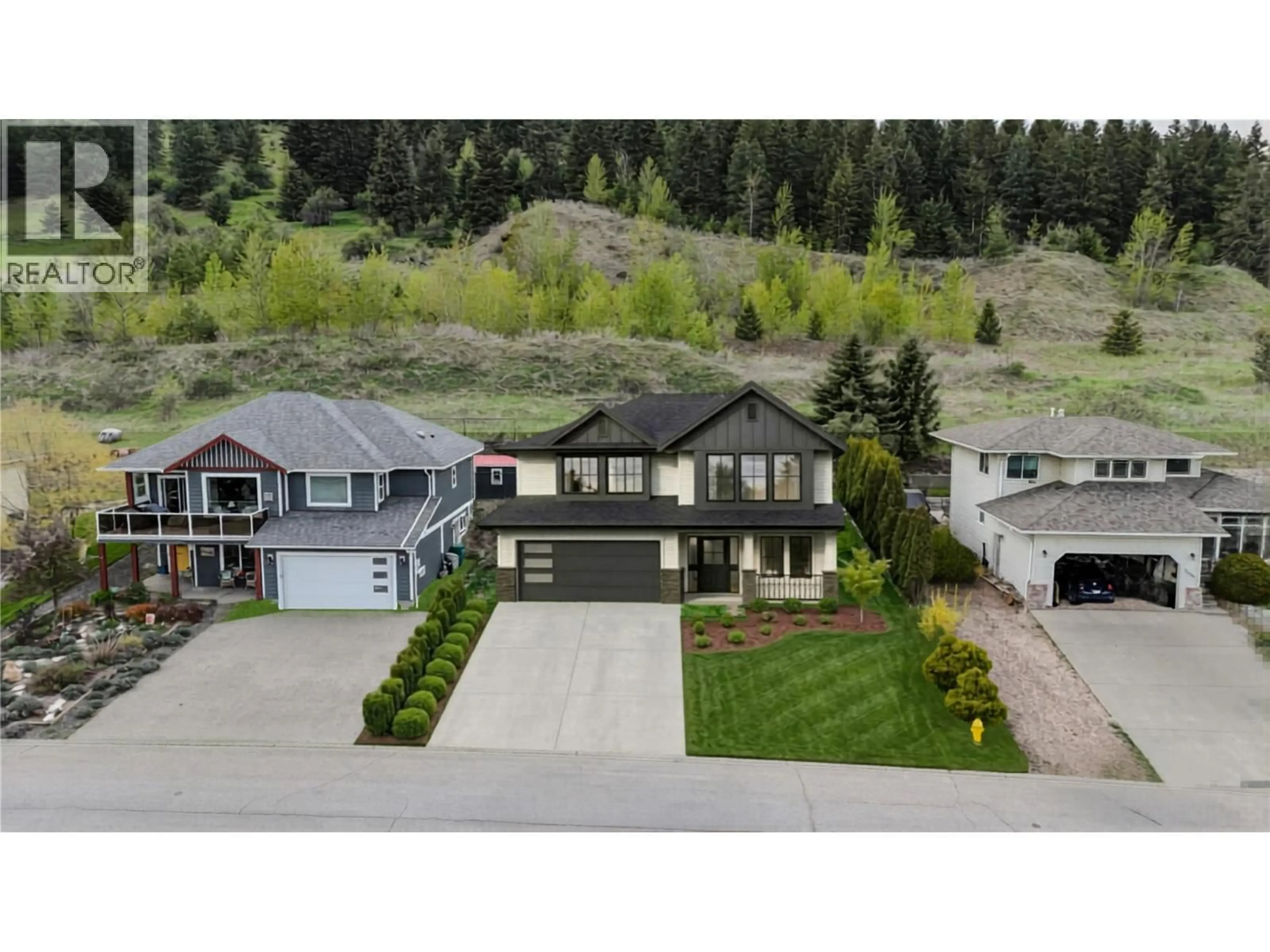 A pic from outside/outdoor area/front of a property/back of a property/a pic from drone, mountain view for 2000 MOUNTAIN VIEW AVENUE, Lumby British Columbia V0E2G0