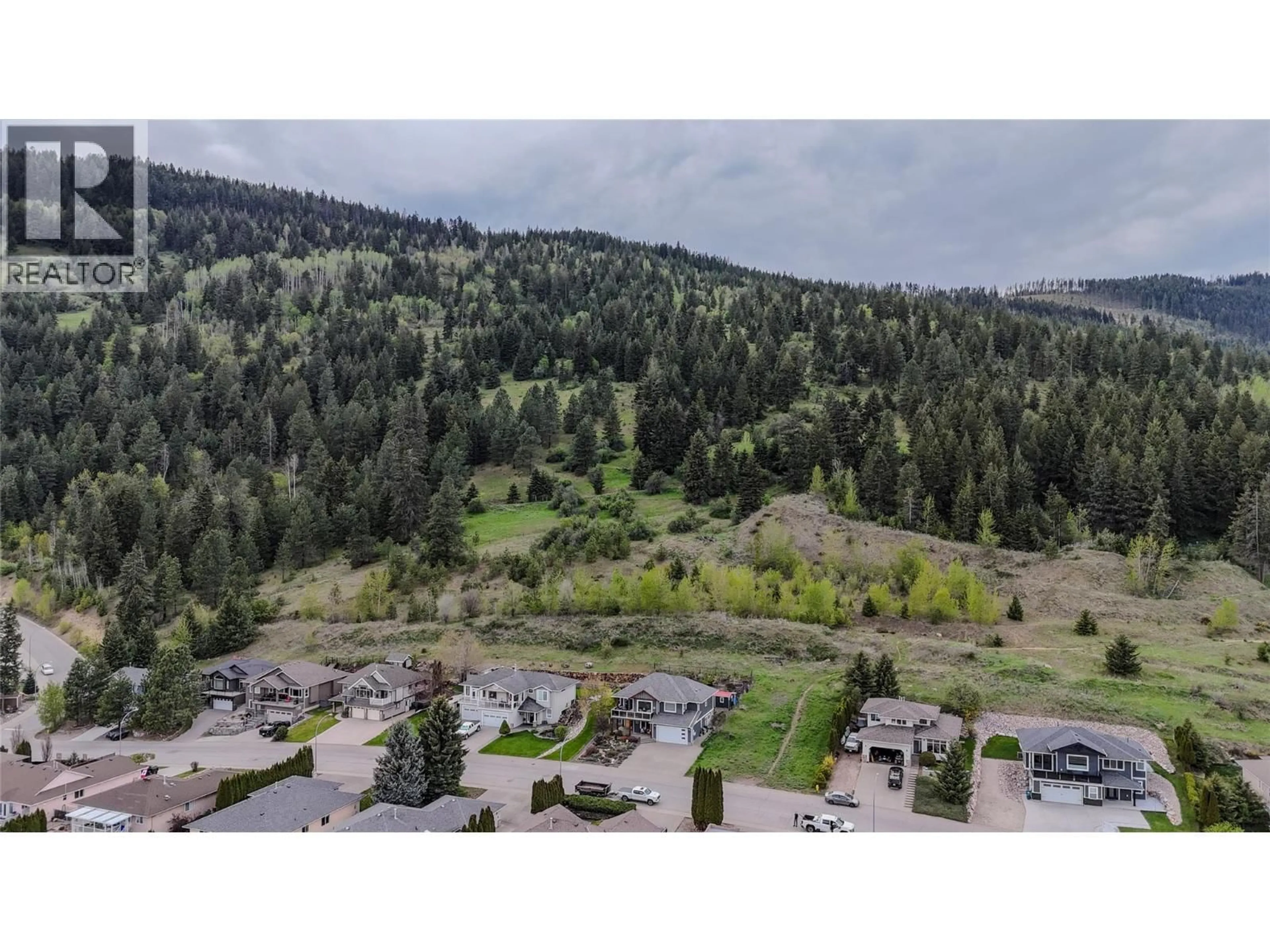 A pic from outside/outdoor area/front of a property/back of a property/a pic from drone, forest/trees view for 2000 MOUNTAIN VIEW AVENUE, Lumby British Columbia V0E2G0