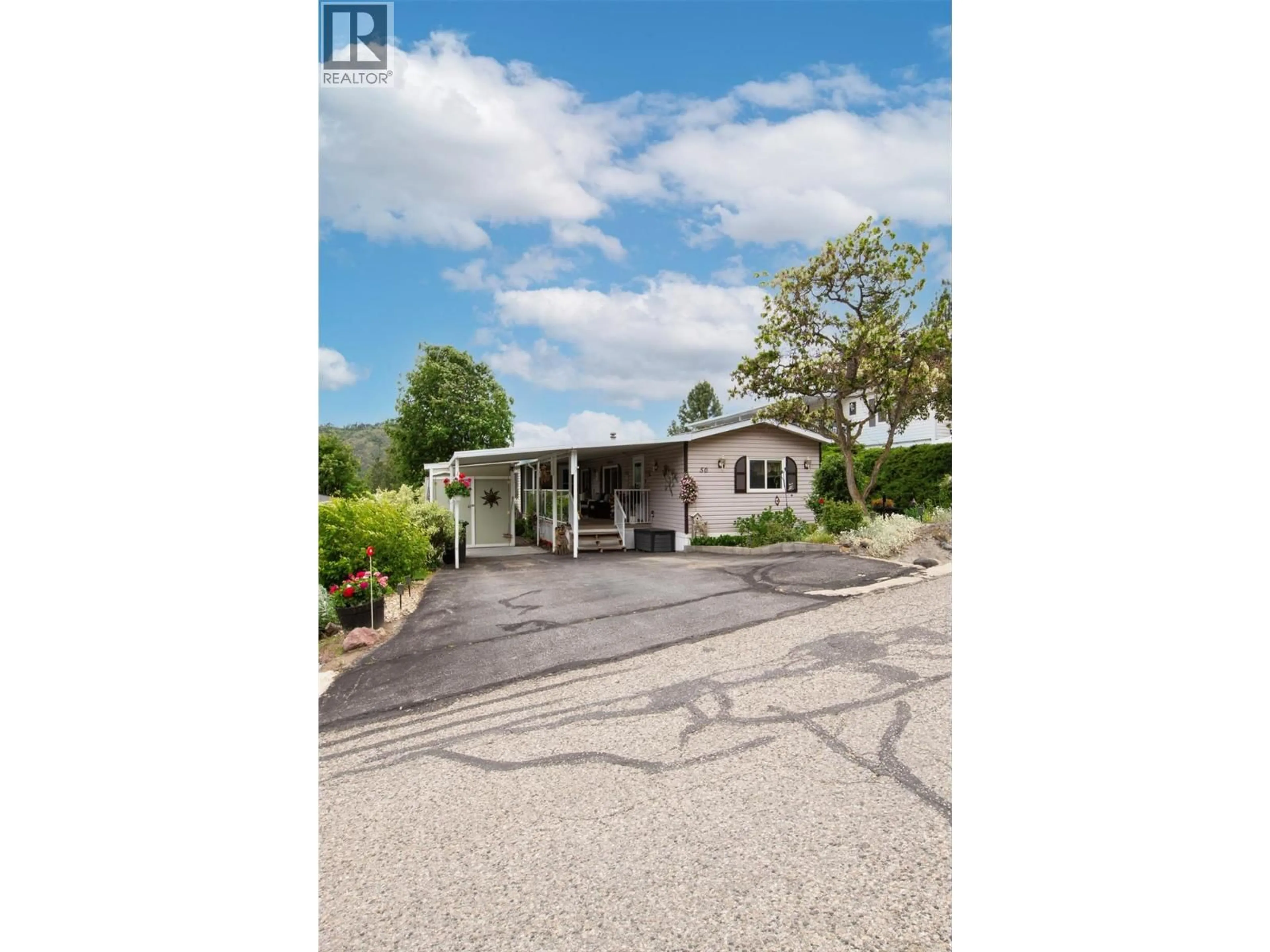 A pic from outside/outdoor area/front of a property/back of a property/a pic from drone, street for 50 - 1750 LENZ ROAD, West Kelowna British Columbia V1Z3N1