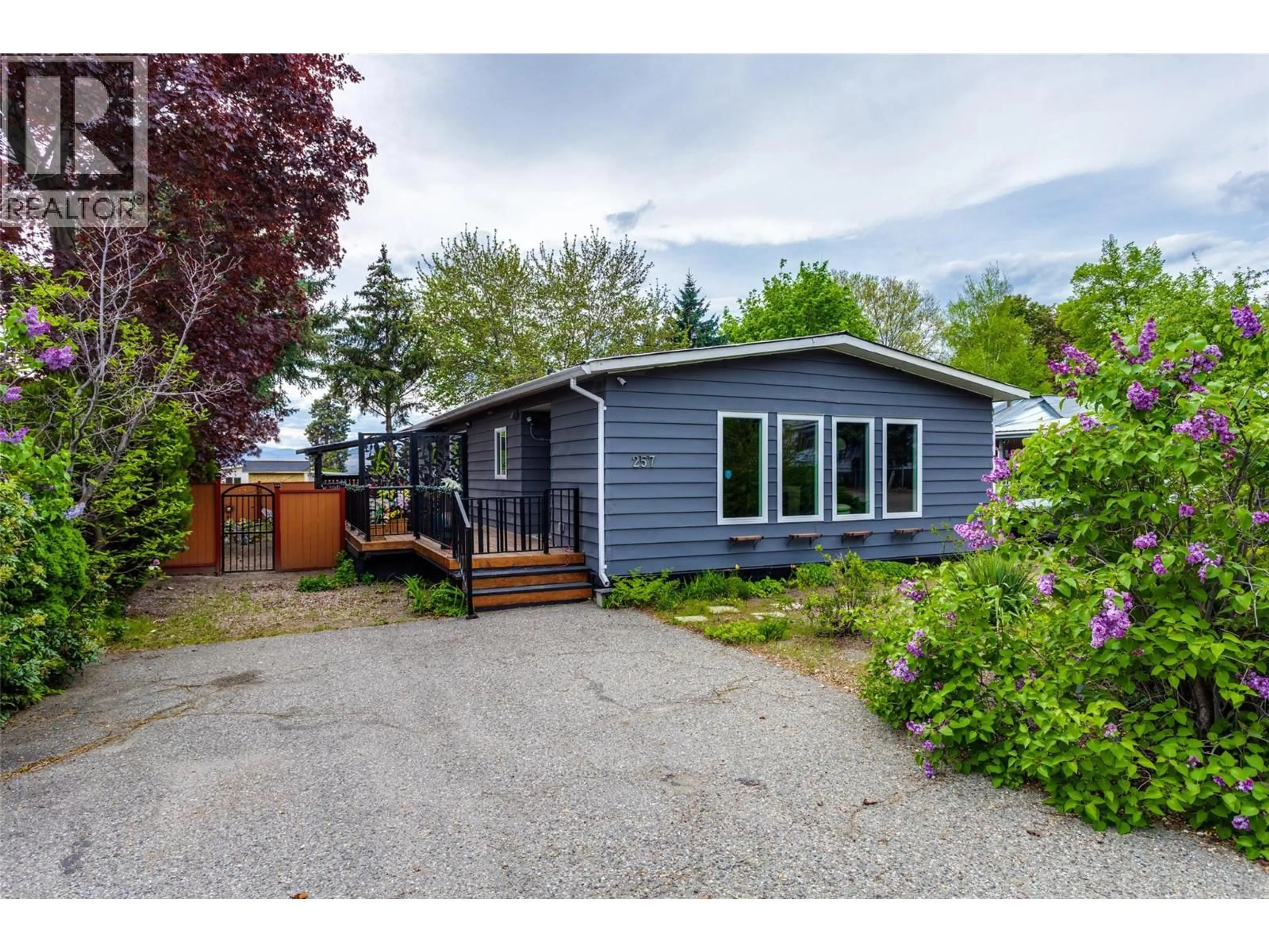 Home with vinyl exterior material, street for 257 - 2001 HIGHWAY 97 OTHER SOUTH, West Kelowna British Columbia V1Z3E3