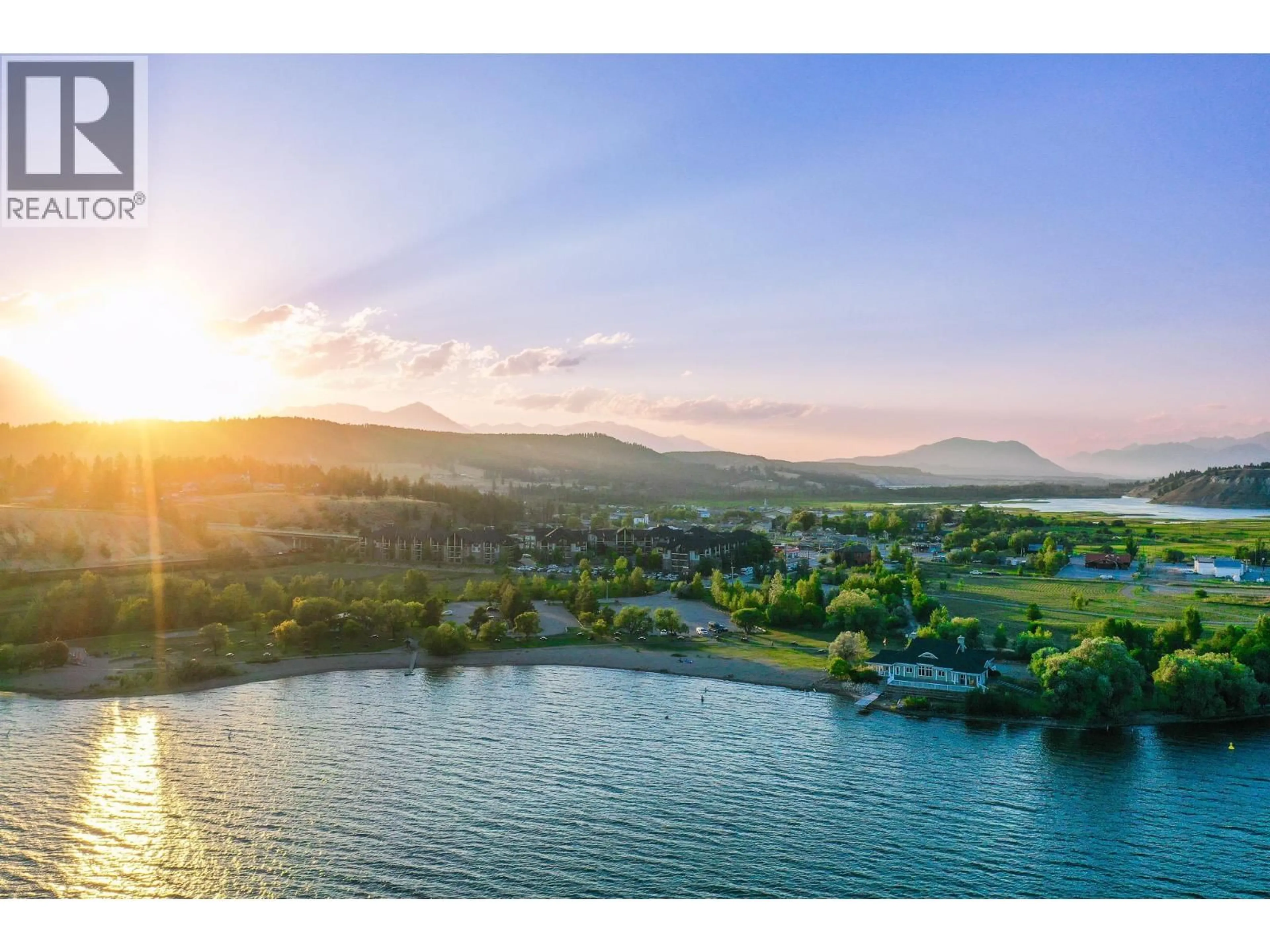 A pic from outside/outdoor area/front of a property/back of a property/a pic from drone, water/lake/river/ocean view for 2201 - 205 THIRD AVENUE, Invermere British Columbia V0A1K7