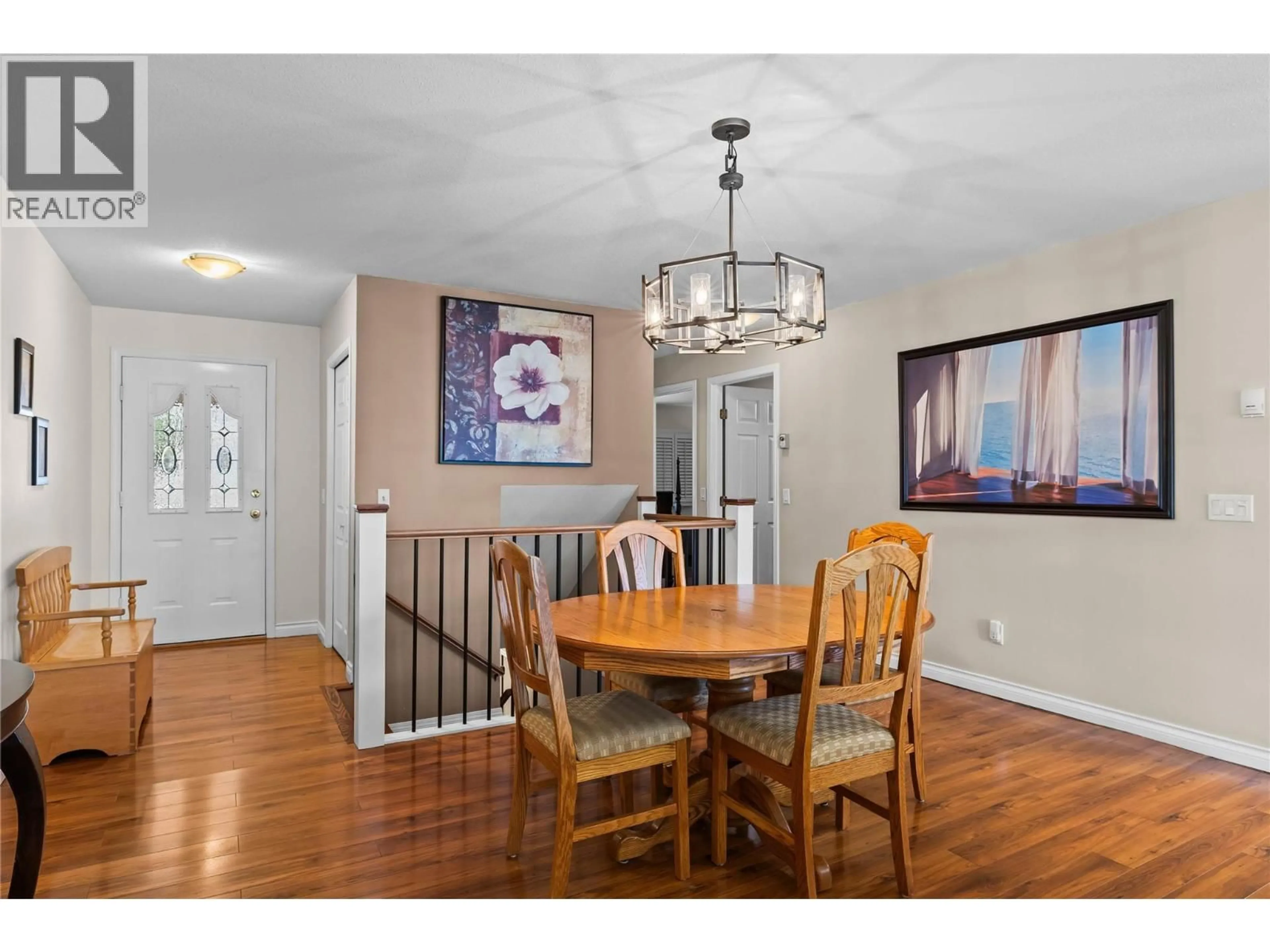 Dining room, wood/laminate floor for 102 - 4450 PONDEROSA DRIVE, Peachland British Columbia V0H1X5