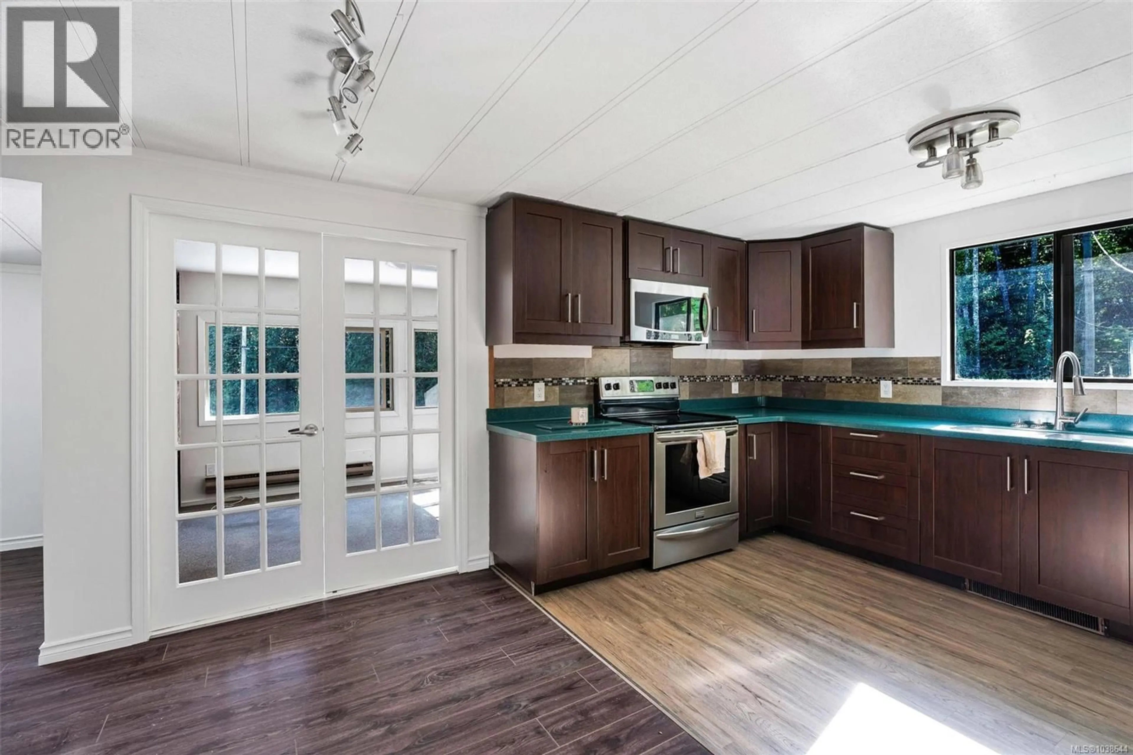 Open concept kitchen, unknown for 1105 BOURBAN ROAD, Mill Bay British Columbia V0R2P2