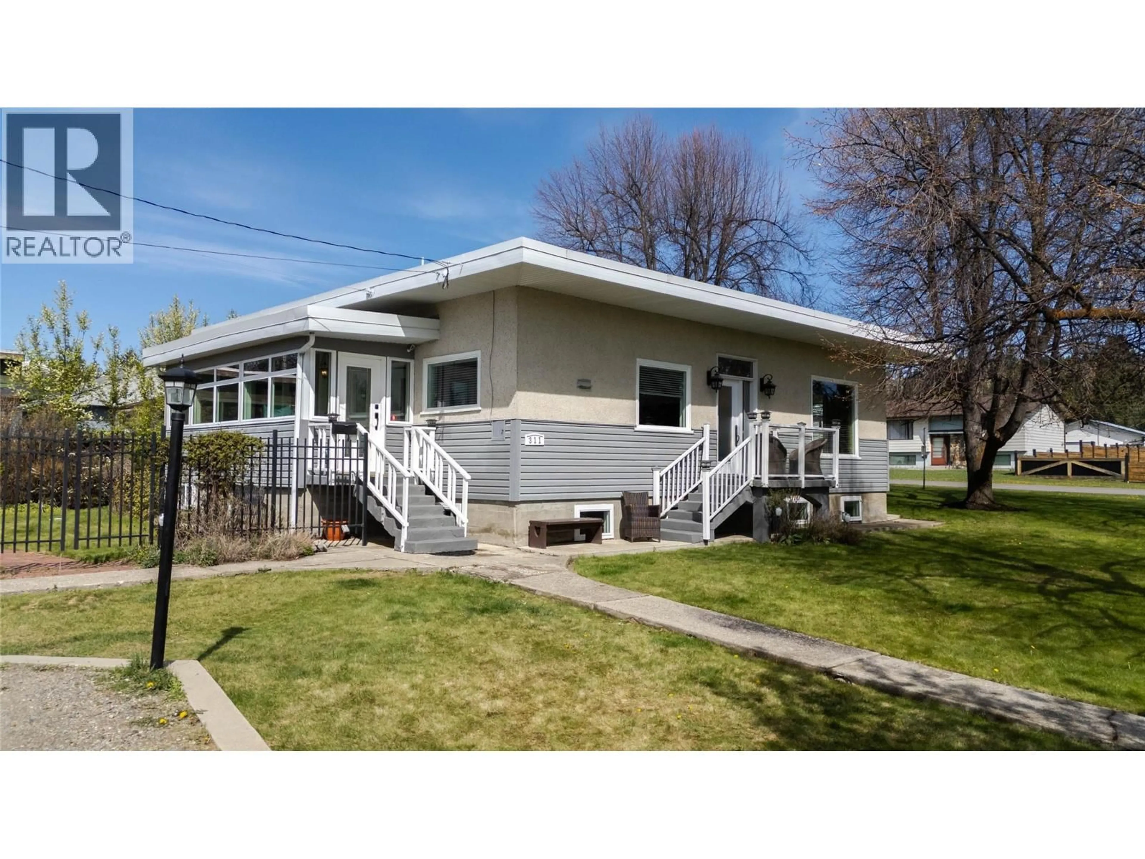 Home with vinyl exterior material, street for 311 307TH AVENUE, Kimberley British Columbia V1A3G8