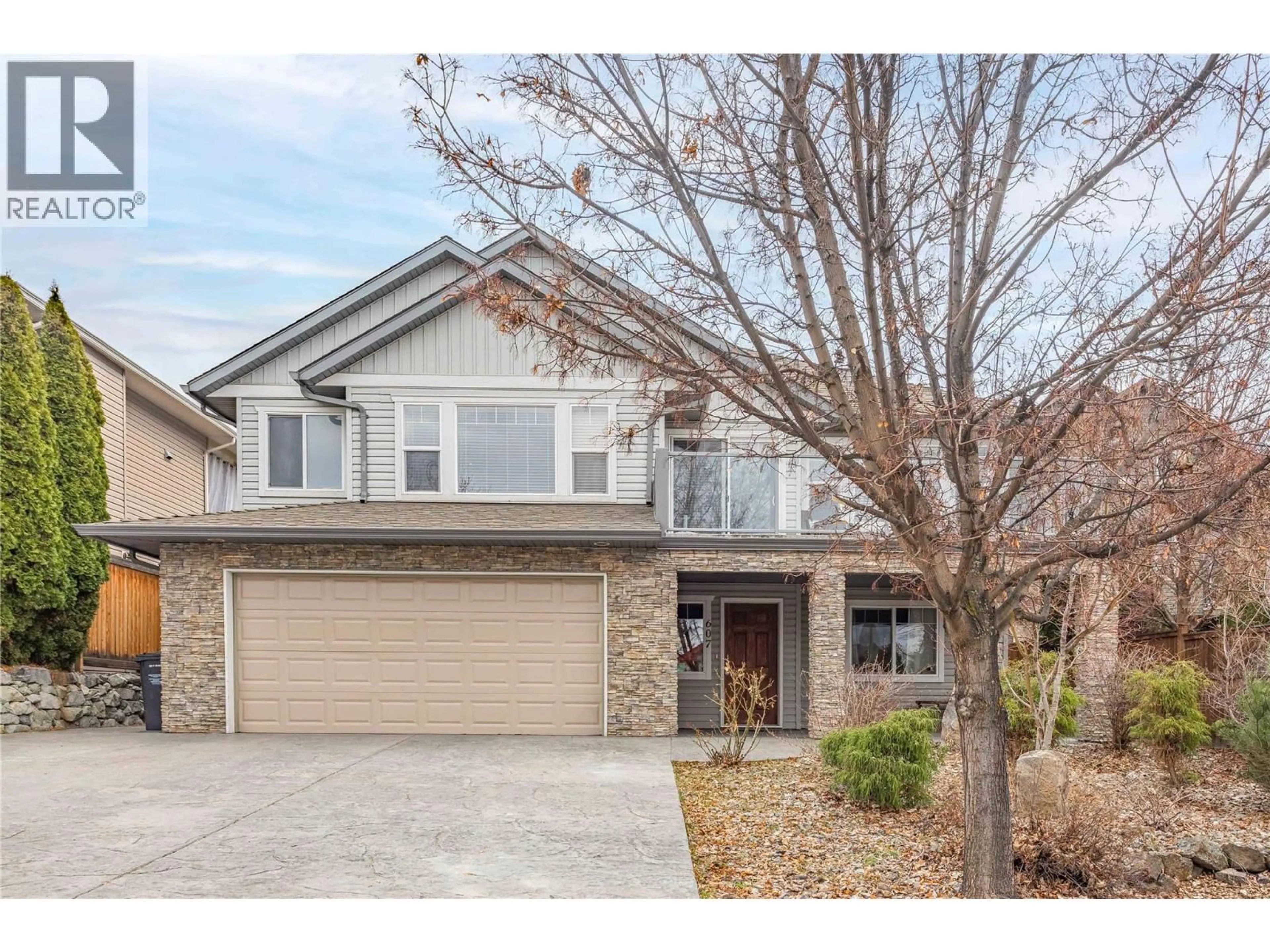 Home with brick exterior material, street for 607 LEFEVERE AVENUE, Kelowna British Columbia V1W5G7