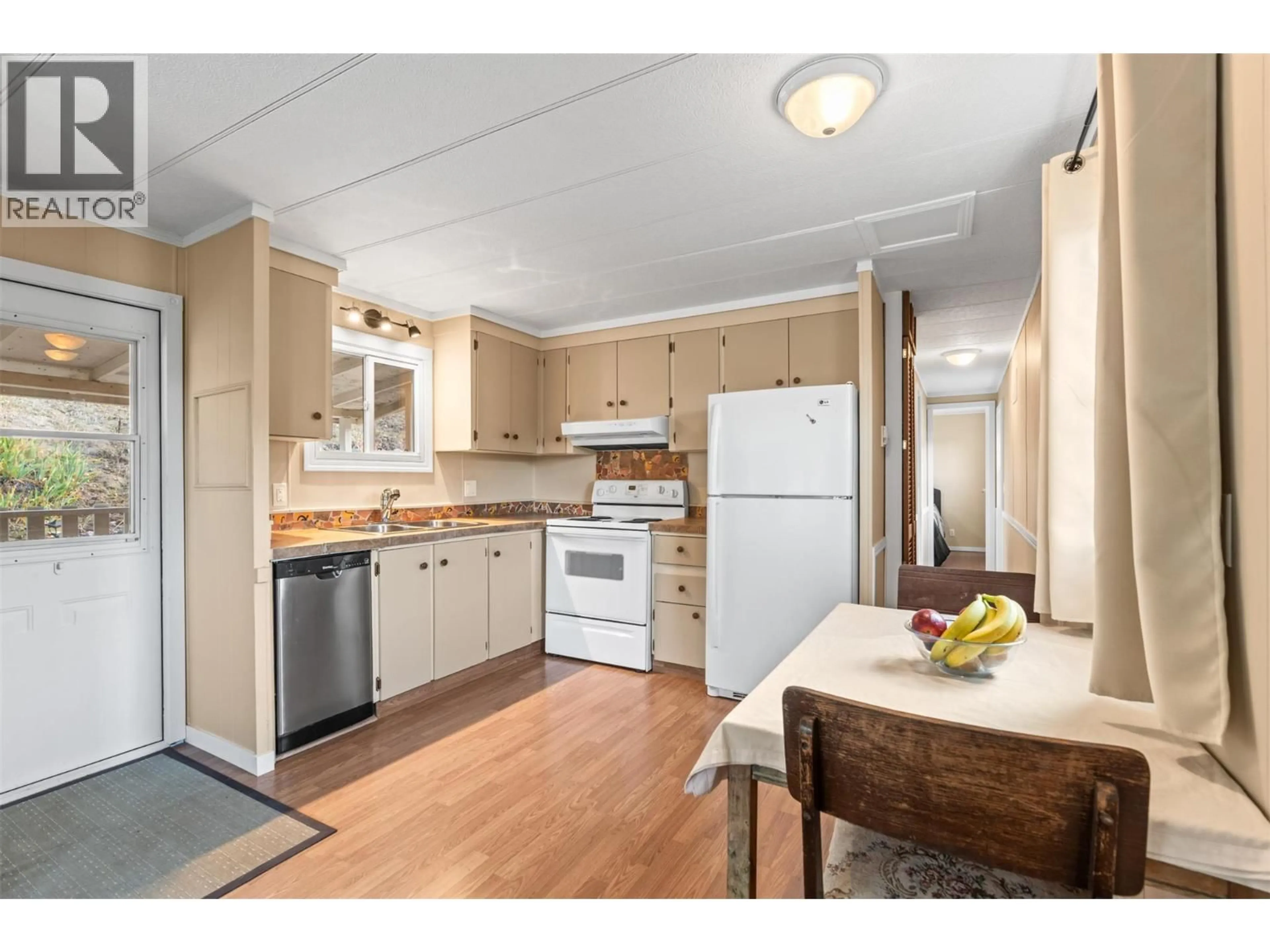 Standard kitchen, wood/laminate floor for 92 - 15401 KALAMALKA ROAD, Coldstream British Columbia V1B1Z3