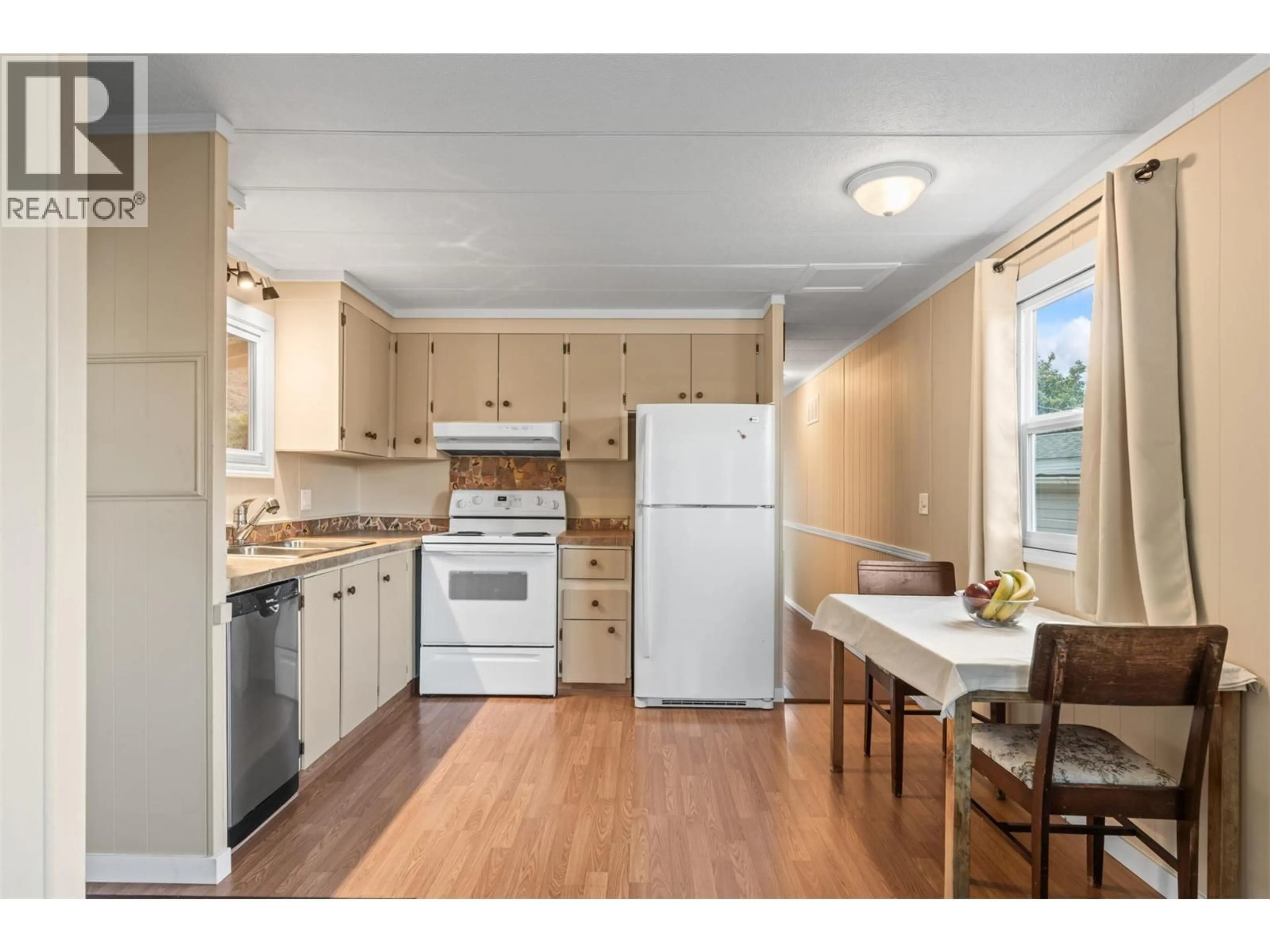 Standard kitchen, wood/laminate floor for 92 - 15401 KALAMALKA ROAD, Coldstream British Columbia V1B1Z3