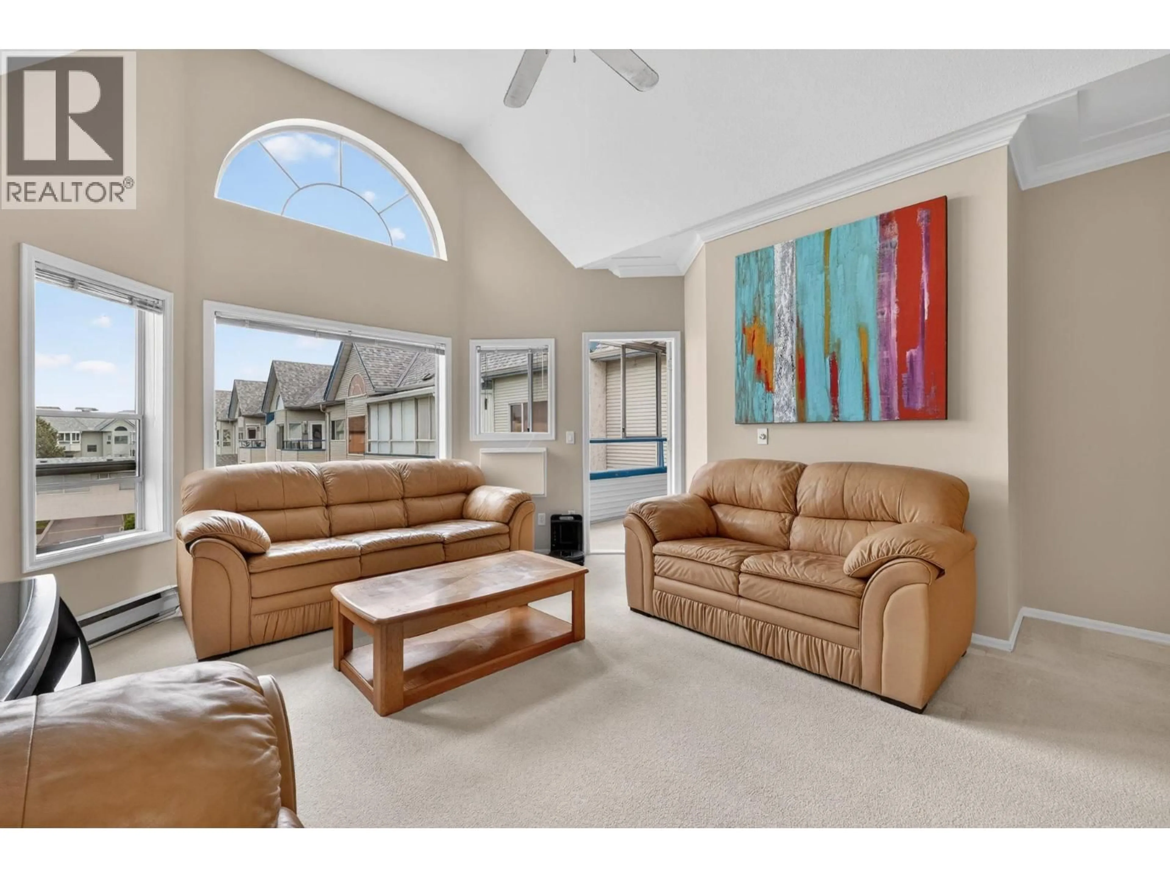 Living room with furniture, unknown for 303 - 877 KLO ROAD, Kelowna British Columbia V1Y9R1