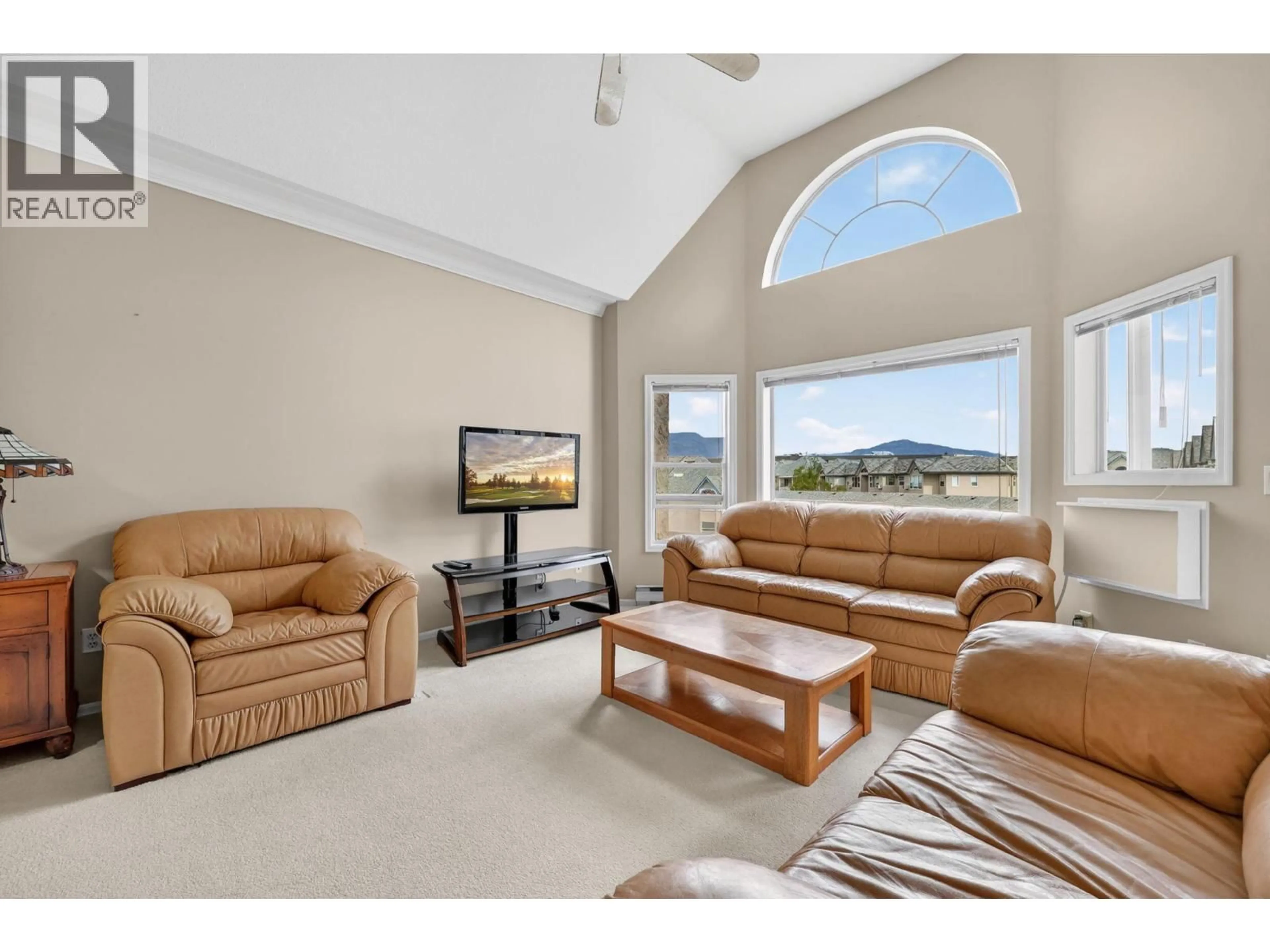 Living room with furniture, unknown for 303 - 877 KLO ROAD, Kelowna British Columbia V1Y9R1