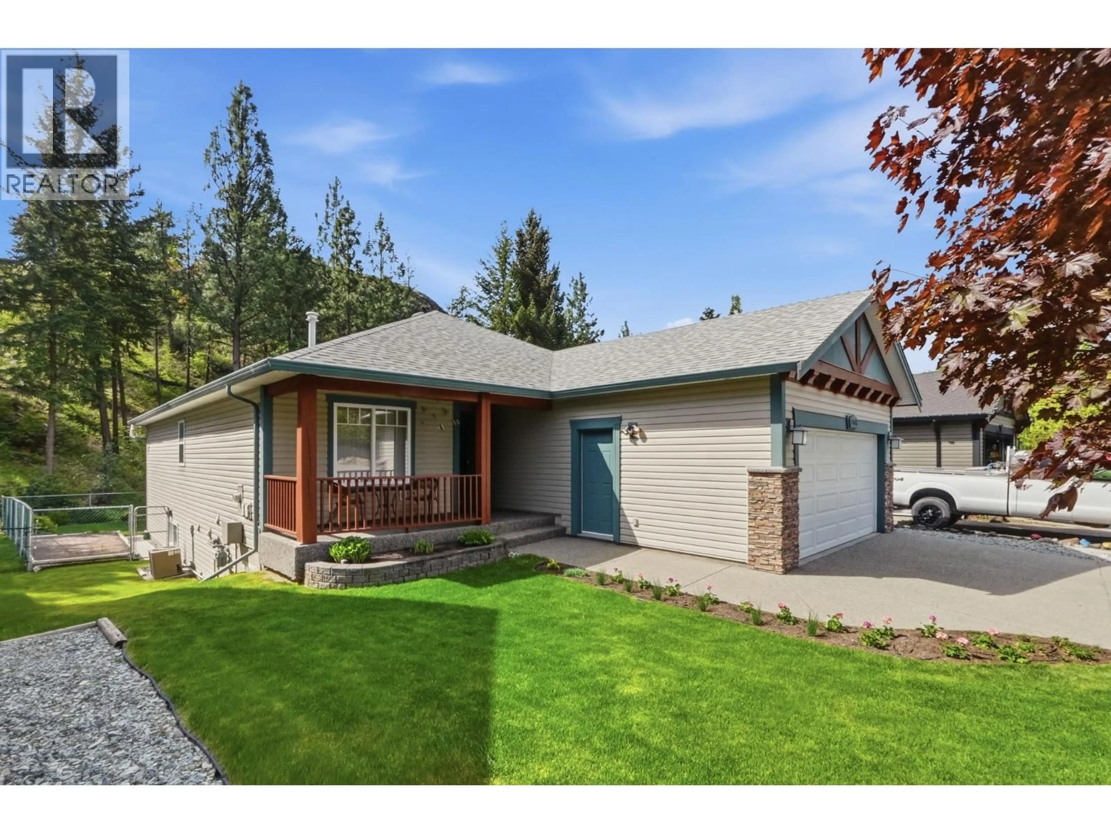Home with vinyl exterior material, street for 1503 ROSE MEADOW DRIVE, West Kelowna British Columbia V1Z4A7