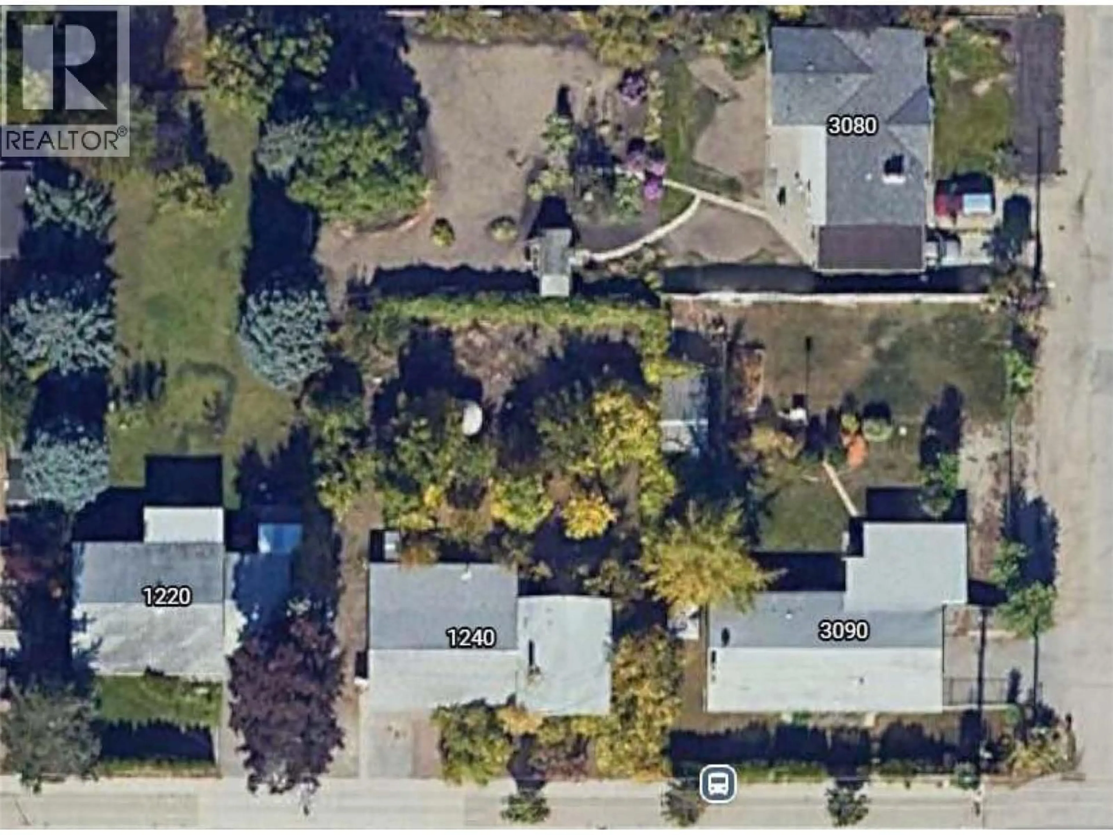 A pic from outside/outdoor area/front of a property/back of a property/a pic from drone, street for 1240 KLO ROAD, Kelowna British Columbia V1V2V6