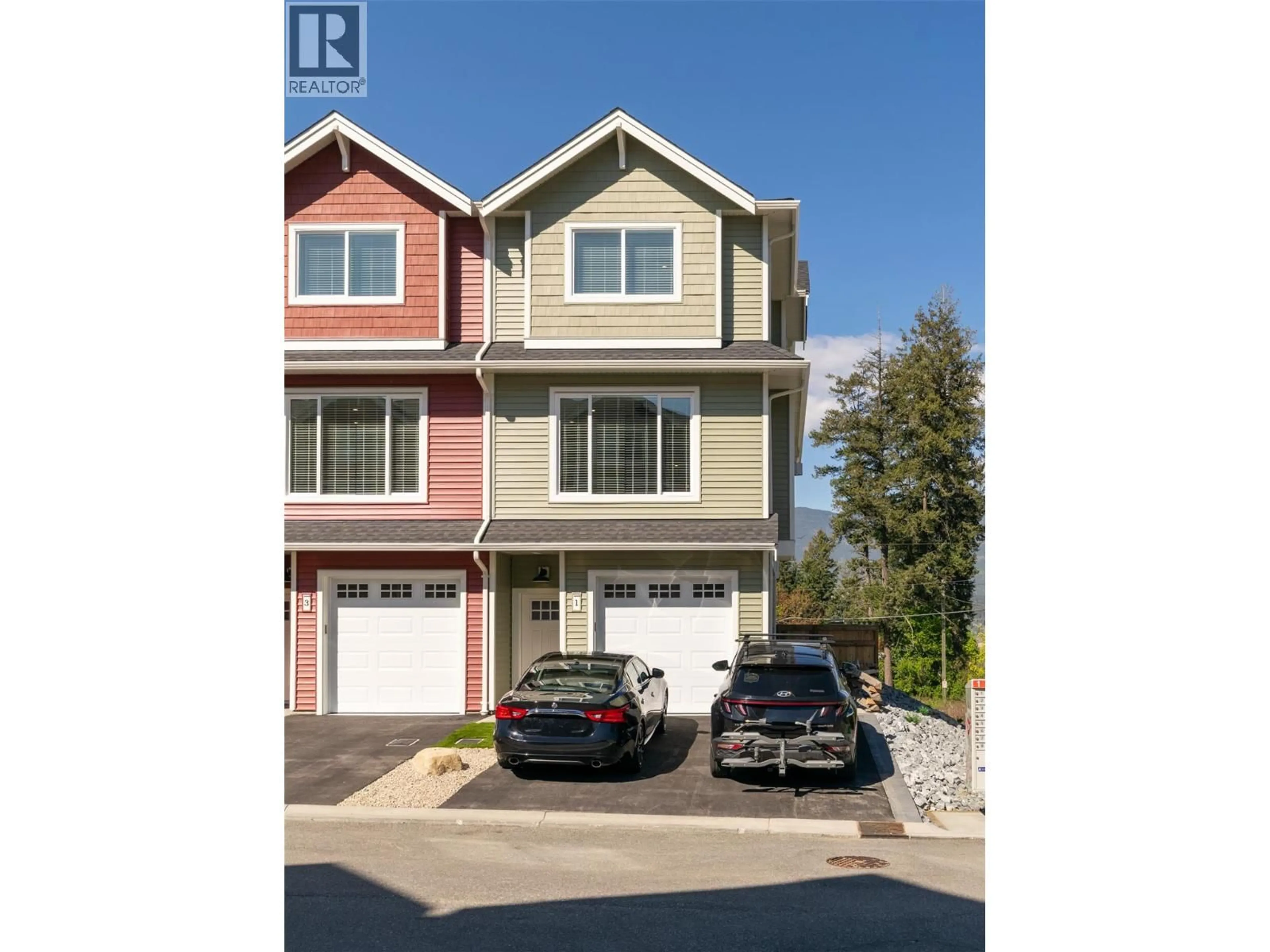 A pic from outside/outdoor area/front of a property/back of a property/a pic from drone, street for 1 - 1910 11 AVENUE NORTHEAST, Salmon Arm British Columbia V1E2V5
